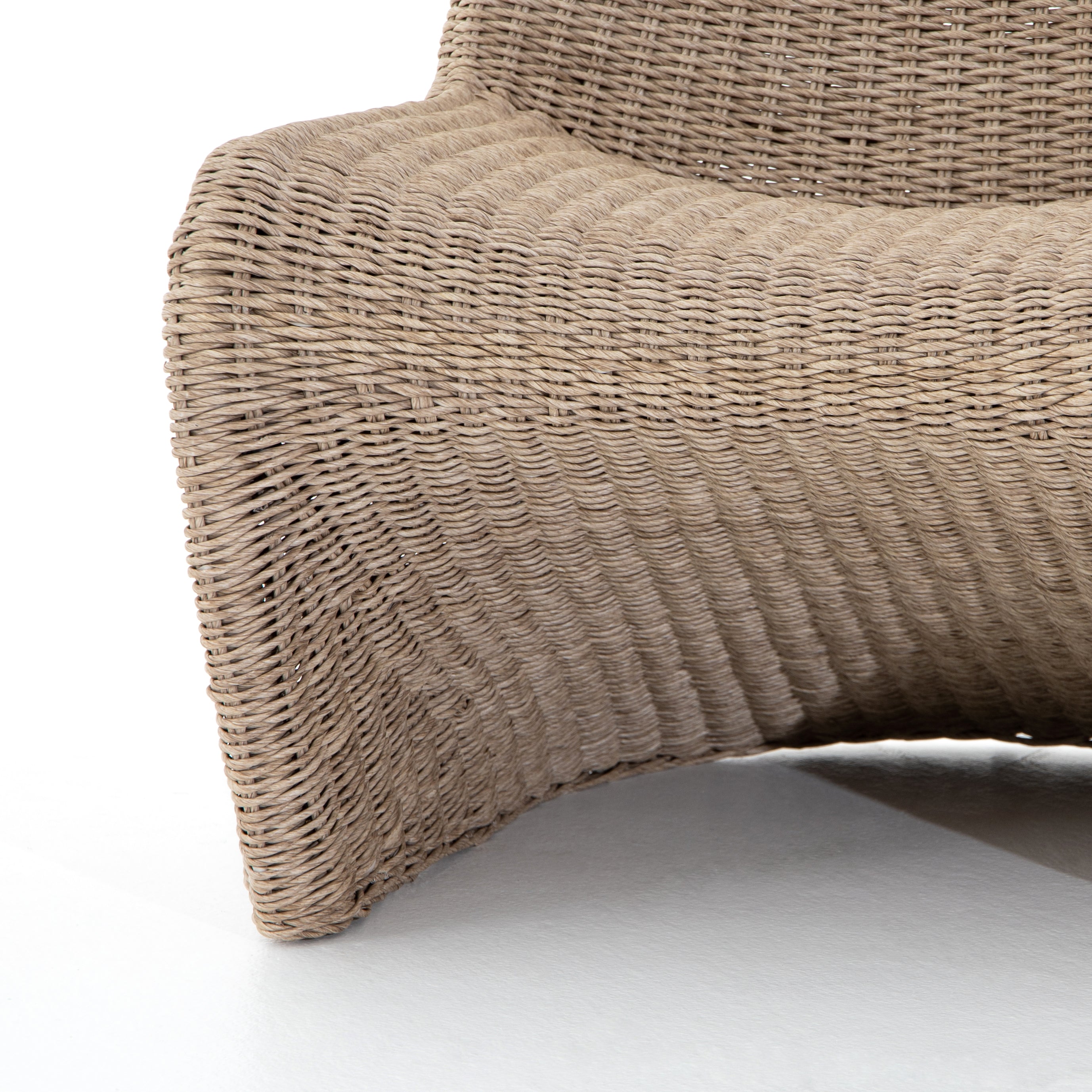 Featuring Portia Outdoor Occasional Chair - Vintage White by Four Hands at Amethyst Home. This Portia Outdoor Occasional Chair - Vintage White features a unique shape for comfortable seating. Finished in a vintage white, all-weather wicker makes this the perfect chair for indoors or out.
Cover or store inside during inclement weather and when not in use.
O.  Amethyst Home provides interior design, new home construction design consulting, vintage area rugs, and lighting in the Calabasas metro area.