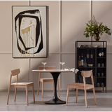 Featuring Powell 42" Dining Table - White Marble by Four Hands at Amethyst Home. We love the mixed materials found in this Powell Dining Table - White Marble. Classic tulip shaping is recast with a rustic black iron base and rounded top of white marble - a perfect addition to any dining room or kitchen! 
Overall Dimensions: 42"W x 42"L x 29.50"H
Colors: Dark R. Amethyst Home provides interior design, new home construction design consulting, vintage area rugs, and lighting in the Austin metro area.