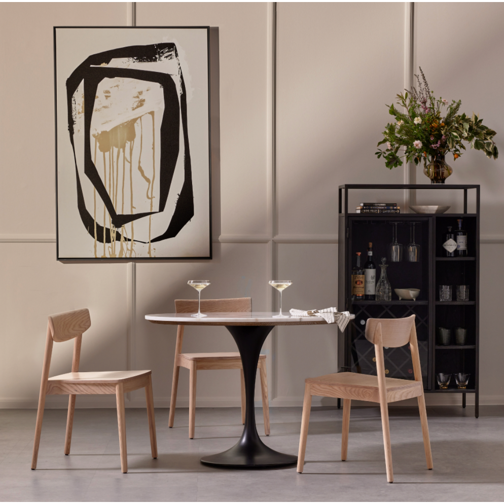 Featuring Powell 42" Dining Table - White Marble by Four Hands at Amethyst Home. We love the mixed materials found in this Powell Dining Table - White Marble. Classic tulip shaping is recast with a rustic black iron base and rounded top of white marble - a perfect addition to any dining room or kitchen! 
Overall Dimensions: 42"W x 42"L x 29.50"H
Colors: Dark R. Amethyst Home provides interior design, new home construction design consulting, vintage area rugs, and lighting in the Austin metro area.