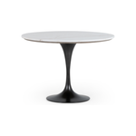 Featuring Powell 42" Dining Table - White Marble by Four Hands at Amethyst Home. We love the mixed materials found in this Powell Dining Table - White Marble. Classic tulip shaping is recast with a rustic black iron base and rounded top of white marble - a perfect addition to any dining room or kitchen! 
Overall Dimensions: 42"W x 42"L x 29.50"H
Colors. Amethyst Home provides interior design, new home construction design consulting, vintage area rugs, and lighting in the Salt Lake City metro area.