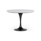 Featuring Powell 42" Dining Table - White Marble by Four Hands at Amethyst Home. We love the mixed materials found in this Powell Dining Table - White Marble. Classic tulip shaping is recast with a rustic black iron base and rounded top of white marble - a perfect addition to any dining room or kitchen! 
Overall Dimensions: 42"W x 42"L x 29.50"H
Colors. Amethyst Home provides interior design, new home construction design consulting, vintage area rugs, and lighting in the Salt Lake City metro area.