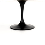Featuring Powell 55" Dining Table - White Marble by Four Hands at Amethyst Home. We love the mixed materials found in this Powell Dining Table - White Marble. Classic tulip shaping is recast with a rustic black iron base and rounded top of white marble - a perfect addition to any dining room or kitchen! 
Overall Dimensions: 55"W x 55"L x 29.50"H
Colors: Dark .  Amethyst Home provides interior design, new home construction design consulting, vintage area rugs, and lighting in the Dallas metro area.