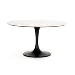 Featuring Powell 55" Dining Table - White Marble by Four Hands at Amethyst Home. We love the mixed materials found in this Powell Dining Table - White Marble. Classic tulip shaping is recast with a rustic black iron base and rounded top of white marble - a perfect addition to any dining room or kitchen! 
Overall Dimensions: 55"W x 55"L x 29.50"H
Colors: D.  Amethyst Home provides interior design, new home construction design consulting, vintage area rugs, and lighting in the Alpharetta metro area.