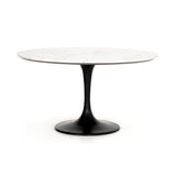 Featuring Powell 55" Dining Table - White Marble by Four Hands at Amethyst Home. We love the mixed materials found in this Powell Dining Table - White Marble. Classic tulip shaping is recast with a rustic black iron base and rounded top of white marble - a perfect addition to any dining room or kitchen! 
Overall Dimensions: 55"W x 55"L x 29.50"H
Colors: D.  Amethyst Home provides interior design, new home construction design consulting, vintage area rugs, and lighting in the Alpharetta metro area.