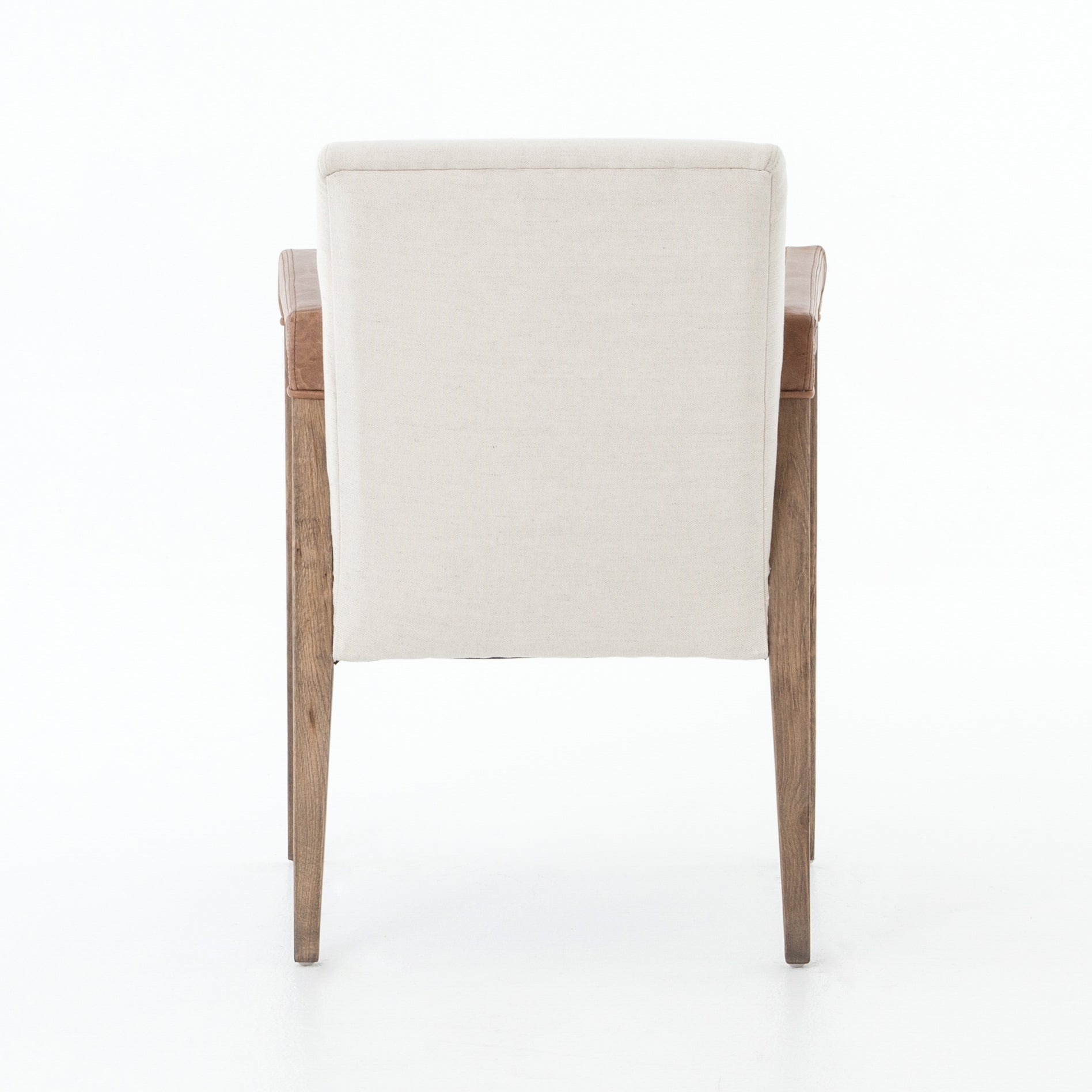 Featuring Reuben Dining Chair - Harbor Natural by Four Hands at Amethyst Home. Elegance is no exaggeration with this Reuben Dining Chair - Harbor Natural. Slim, tapered oak with arms wrapped in vintage leather frames a floating seat covered in natural linen. We'd love to see this in your dining room, kitchen, or other space!
Overall Dimensions: 23.25"W x .  Amethyst Home provides interior design, new home construction design consulting, vintage area rugs, and lighting in the Alpharetta metro area.