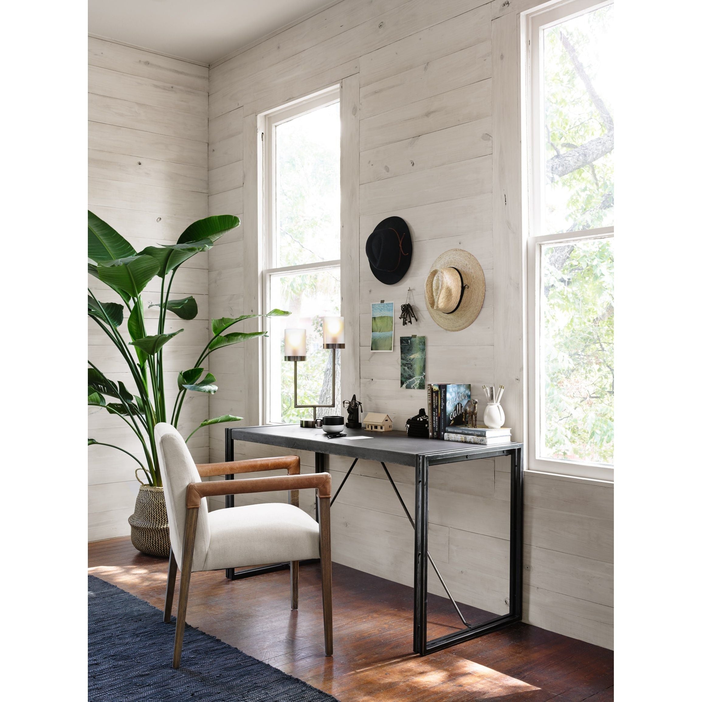 Featuring Reuben Dining Chair - Harbor Natural by Four Hands at Amethyst Home. Elegance is no exaggeration with this Reuben Dining Chair - Harbor Natural. Slim, tapered oak with arms wrapped in vintage leather frames a floating seat covered in natural linen. We'd love to see this in your dining room, kitchen, or other space!
Overall Dimensions: 23.25"W x 2.  Amethyst Home provides interior design, new home construction design consulting, vintage area rugs, and lighting in the Nashville metro area.