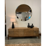 Featuring Reza Media Console - Smoked Honey by Four Hands at Amethyst Home. We love mid-century feel to this Reza Media Console - Smoked Honey. Finished in a light, smoked honey, a clean-lined parawood console sits in an arched cradle base of toasted acacia, for fresh contrast. Twist-lock metal hardware adds a clever finishing touch. Rear cutouts for media. Amethyst Home provides interior design, new home construction design consulting, vintage area rugs, and lighting in the Des Moines metro area.