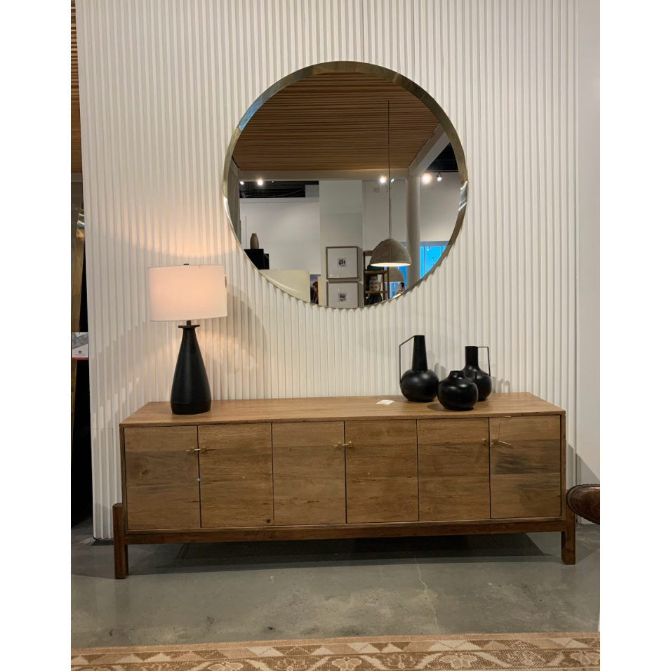 Featuring Reza Media Console - Smoked Honey by Four Hands at Amethyst Home. We love mid-century feel to this Reza Media Console - Smoked Honey. Finished in a light, smoked honey, a clean-lined parawood console sits in an arched cradle base of toasted acacia, for fresh contrast. Twist-lock metal hardware adds a clever finishing touch. Rear cutouts for media. Amethyst Home provides interior design, new home construction design consulting, vintage area rugs, and lighting in the Des Moines metro area.