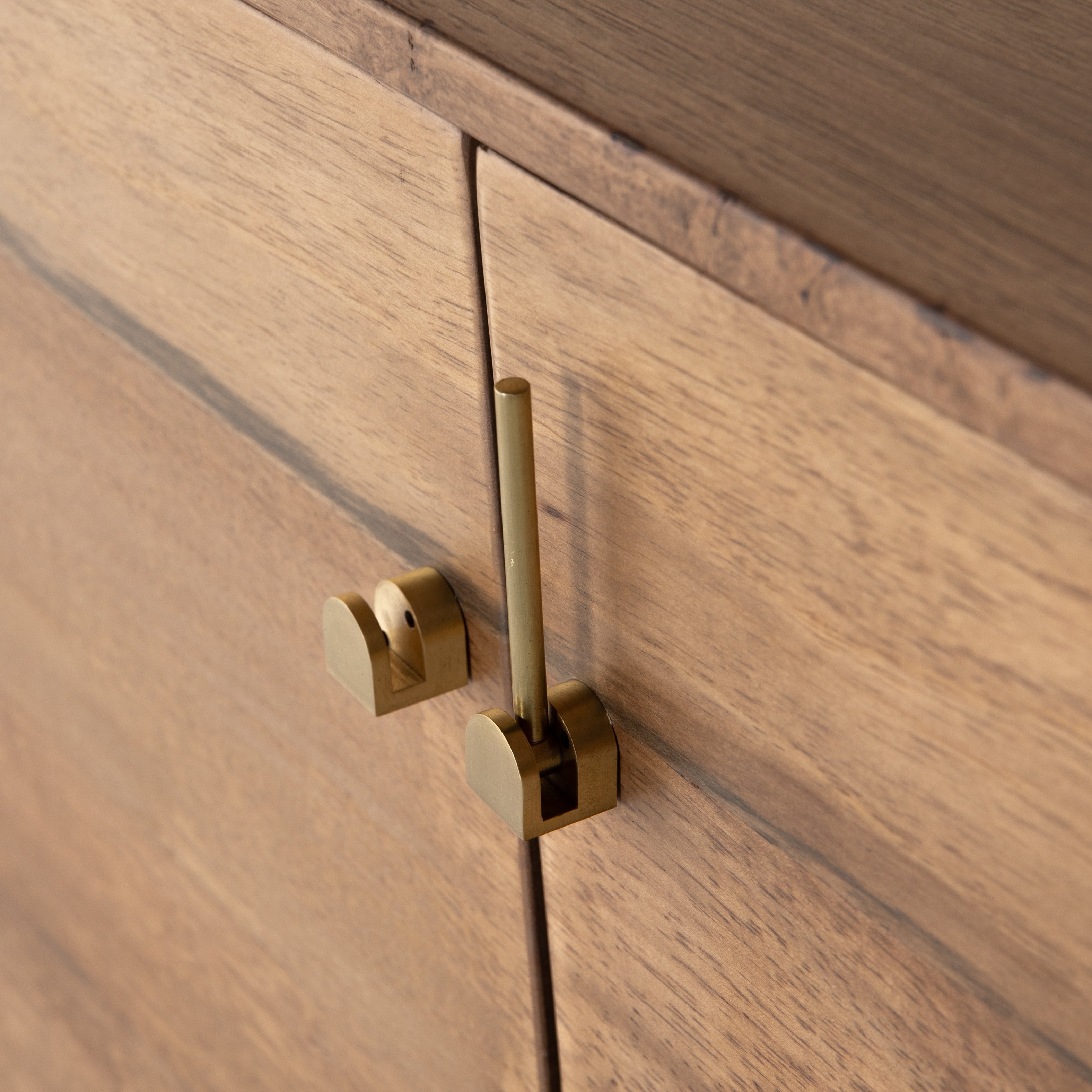 Featuring Reza Media Console - Smoked Honey by Four Hands at Amethyst Home. We love mid-century feel to this Reza Media Console - Smoked Honey. Finished in a light, smoked honey, a clean-lined parawood console sits in an arched cradle base of toasted acacia, for fresh contrast. Twist-lock metal hardware adds a clever finishing touch. Rear cutouts for med.  Amethyst Home provides interior design, new home construction design consulting, vintage area rugs, and lighting in the Los Angeles metro area.