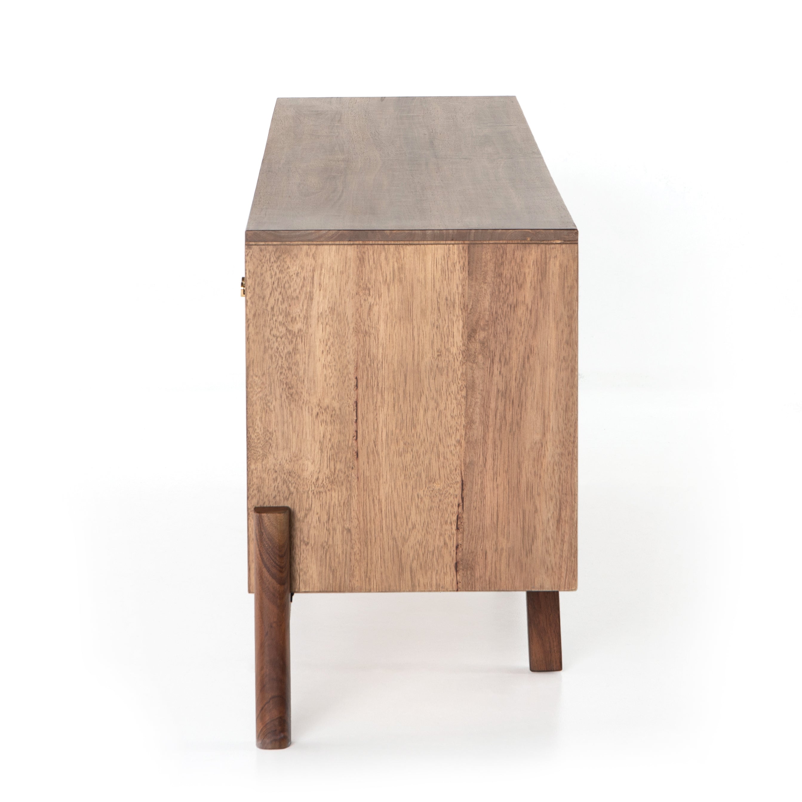 We love mid-century feel to this Reza Media Console - Smoked Honey. Finished in a light, smoked honey, a clean-lined parawood console sits in an arched cradle base of toasted acacia, for fresh contrast. Twist-lock metal hardware adds a clever finishing touch. Rear cutouts for media cord management.  Overall Dimensions: 84.00"w x 18.00"d x 28.25"h