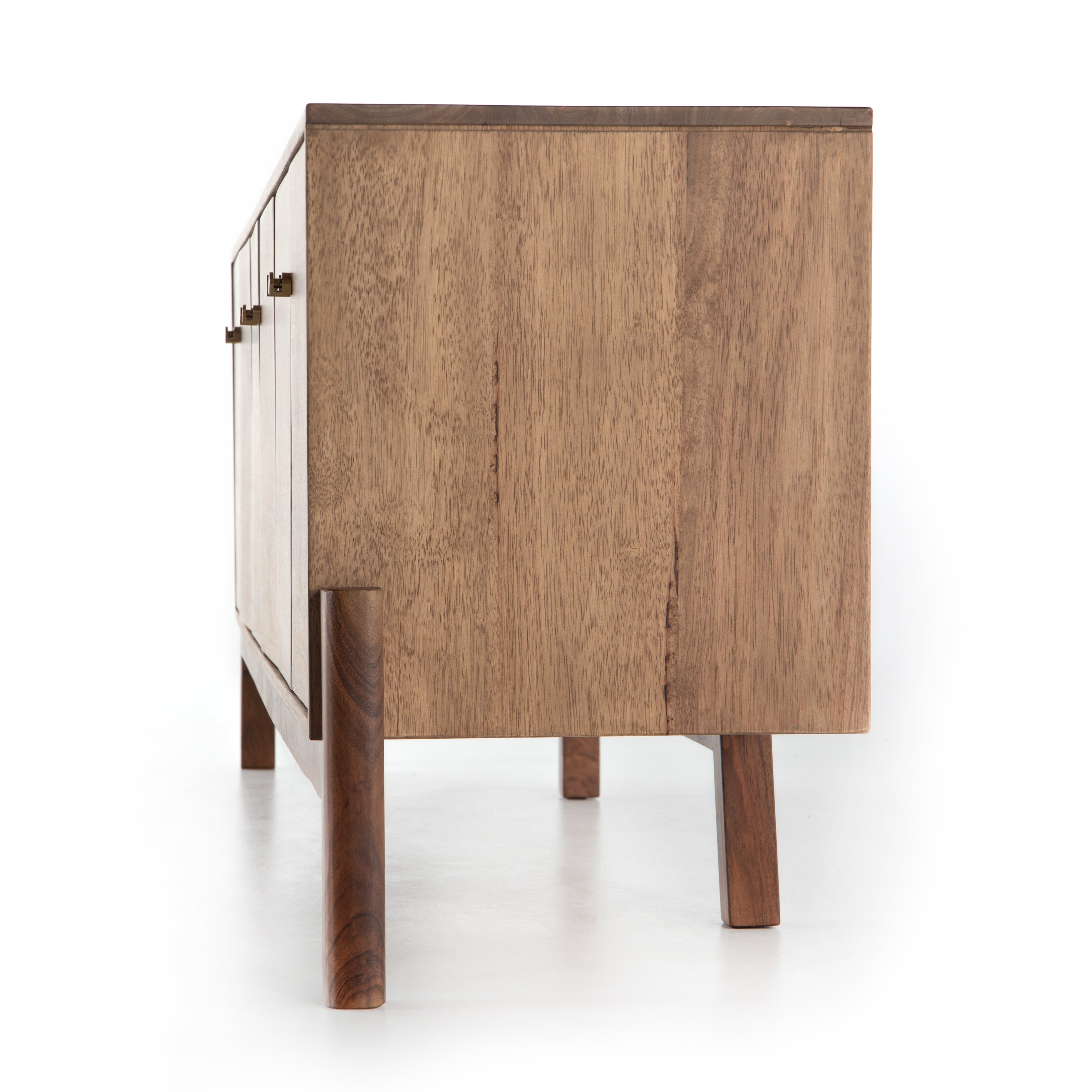 We love mid-century feel to this Reza Media Console - Smoked Honey. Finished in a light, smoked honey, a clean-lined parawood console sits in an arched cradle base of toasted acacia, for fresh contrast. Twist-lock metal hardware adds a clever finishing touch. Rear cutouts for media cord management.  Overall Dimensions: 84.00"w x 18.00"d x 28.25"h