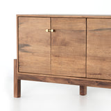 Featuring Reza Media Console - Smoked Honey by Four Hands at Amethyst Home. We love mid-century feel to this Reza Media Console - Smoked Honey. Finished in a light, smoked honey, a clean-lined parawood console sits in an arched cradle base of toasted acacia, for fresh contrast. Twist-lock metal hardware adds a clever finishing touch. Rear cutouts for media.  Amethyst Home provides interior design, new home construction design consulting, vintage area rugs, and lighting in the Park City metro area.