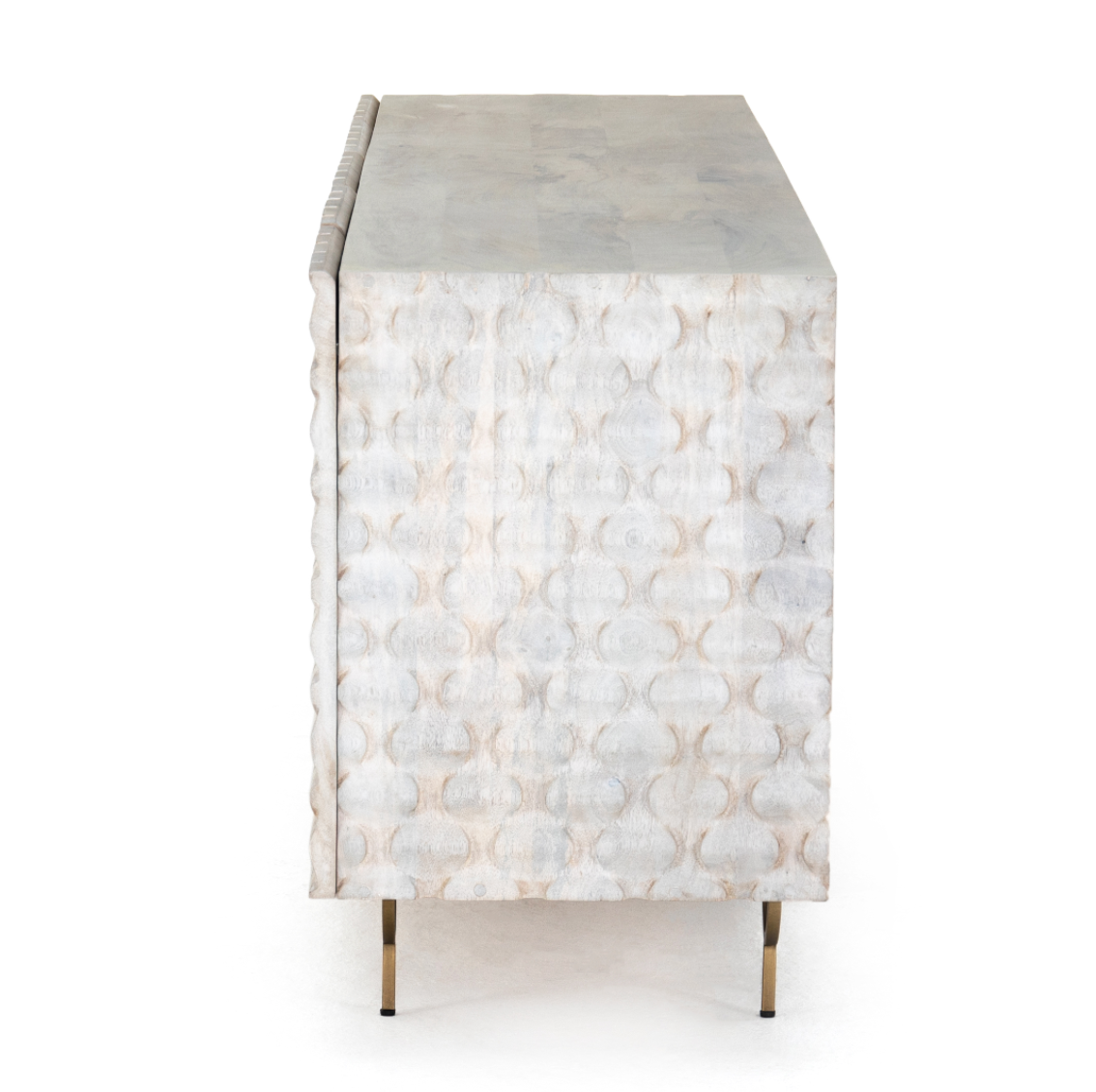 We love the texture of this Rio Media Console - Round Cut White Wash. Made from solid mango with spacious interior shelving and a rear cutout for card management, this is a beautiful piece to add to any living room or entertainment area.   Overall Dimensions: 82.00"w x 18.25"d x 28.00"h