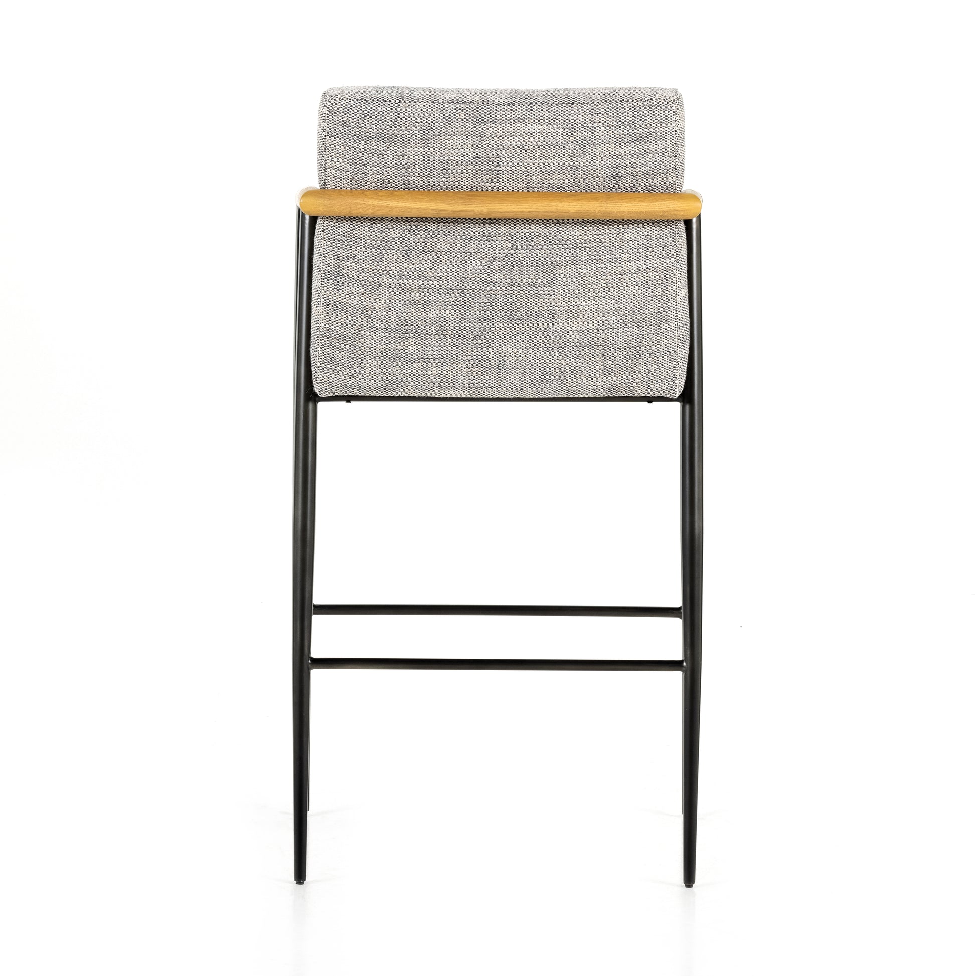 We love the textural grey seating upholstered in a high-performance fabric on this Rowen Bar + Counter Stool - Thames Raven. The angular solid oak arms and black-finished stainless steel framing is perfectly sized to elevate your bar or counter space. 
