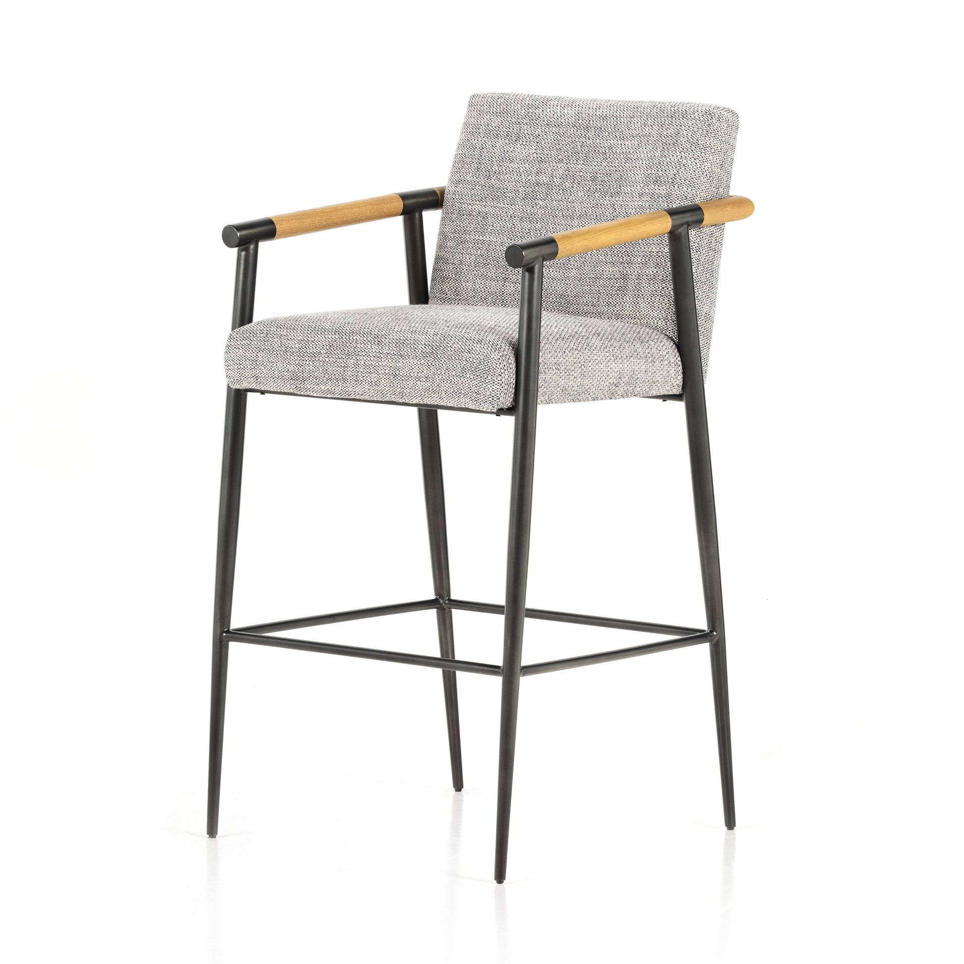 We love the textural grey seating upholstered in a high-performance fabric on this Rowen Bar + Counter Stool - Thames Raven. The angular solid oak arms and black-finished stainless steel framing is perfectly sized to elevate your bar or counter space. 