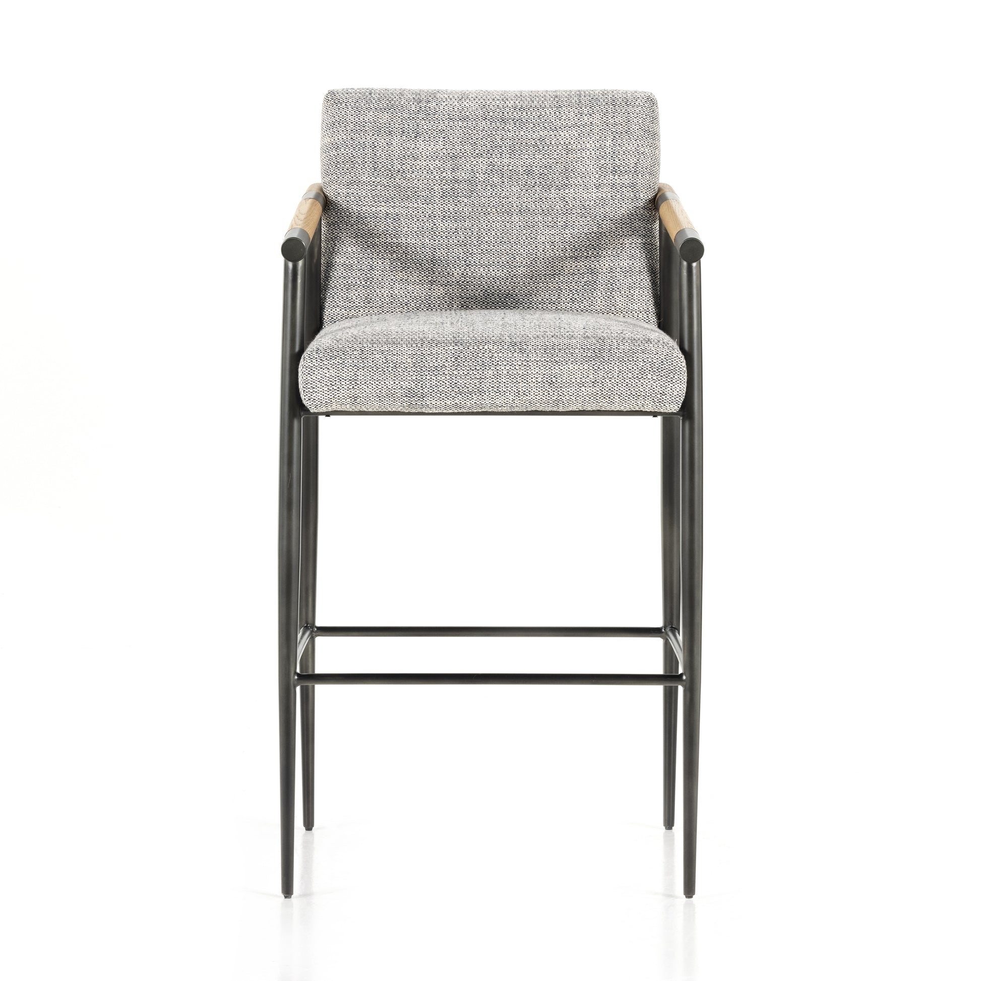 We love the textural grey seating upholstered in a high-performance fabric on this Rowen Bar + Counter Stool - Thames Raven. The angular solid oak arms and black-finished stainless steel framing is perfectly sized to elevate your bar or counter space. 