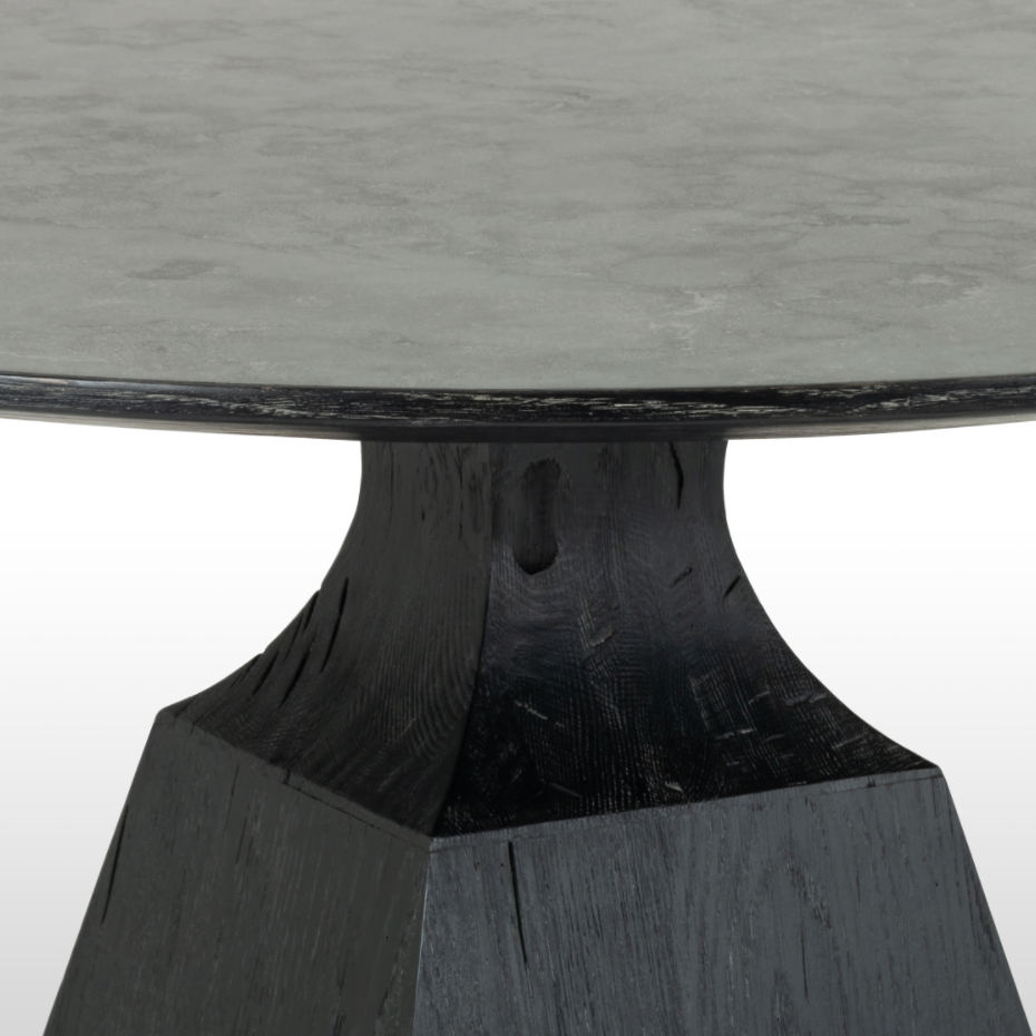 Featuring Sargon Dining Table - Bluestone by Four Hands at Amethyst Home. We love the unique bell shape of this Sargon Bluestone Dining Table. It brings an industrial feel to any dining room. 
Overall Dimensions: 53.25"W x 53.25"L x 30"H
Colors: Washed Black, BluestoneMaterials: Solid Oak, BluestoneWeight: 235.89 lbVolume: 28.71 cu ftClearance from Floor:.  Amethyst Home provides interior design, new home construction design consulting, vintage area rugs, and lighting in the Des Moines metro area.