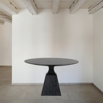 Featuring Sargon Dining Table - Bluestone by Four Hands at Amethyst Home. We love the unique bell shape of this Sargon Bluestone Dining Table. It brings an industrial feel to any dining room. 
Overall Dimensions: 53.25"W x 53.25"L x 30"H
Colors: Washed Black, BluestoneMaterials: Solid Oak, BluestoneWeight: 235.89 lbVolume: 28.71 cu ftClearance from Floor: 28".  Amethyst Home provides interior design, new home construction design consulting, vintage area rugs, and lighting in the Boston metro area.