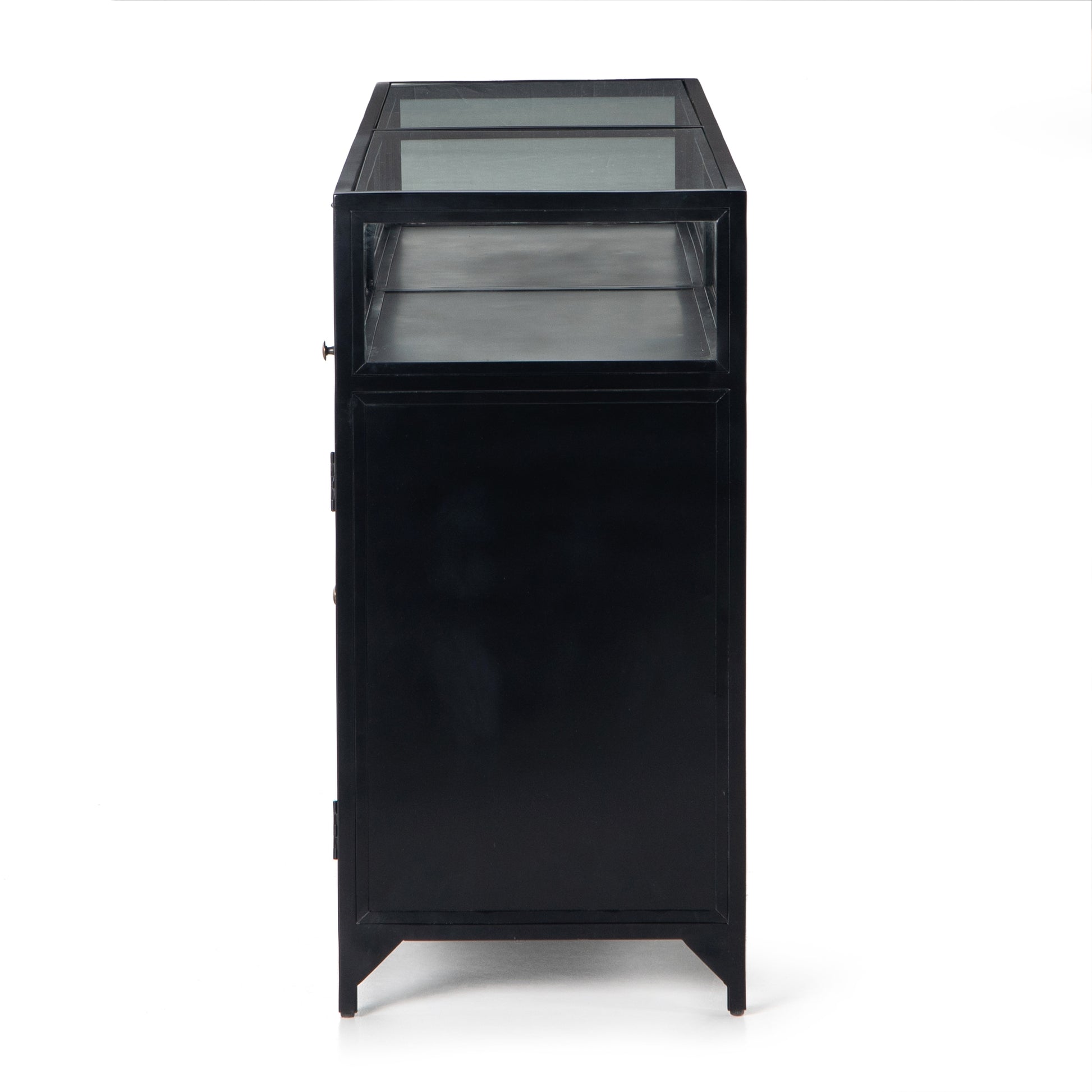This Shadow Box Sideboard gives your inner collector a place to play. Store prized possessions behind clear glass fronts, with black-finished metal casing and brass hardware for contrast.  Overall Dimensions: 70.00"w x 17.25"d x 35.00"h