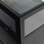 Featuring Shadow Box Sideboard - Black by Four Hands at Amethyst Home. This Shadow Box Sideboard gives your inner collector a place to play. Store prized possessions behind clear glass fronts, with black-finished metal casing and brass hardware for contrast.
Overall Dimensions: 70"W x 17.25"L x 35"H
Colors: Black, Weathered Bronze, Clear Glass, Tempere.  Amethyst Home provides interior design, new home construction design consulting, vintage area rugs, and lighting in the Newport Beach metro area.