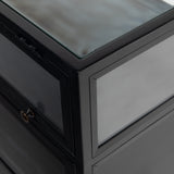 Featuring Shadow Box Sideboard - Black by Four Hands at Amethyst Home. This Shadow Box Sideboard gives your inner collector a place to play. Store prized possessions behind clear glass fronts, with black-finished metal casing and brass hardware for contrast.
Overall Dimensions: 70"W x 17.25"L x 35"H
Colors: Black, Weathered Bronze, Clear Glass, Tempere.  Amethyst Home provides interior design, new home construction design consulting, vintage area rugs, and lighting in the Newport Beach metro area.