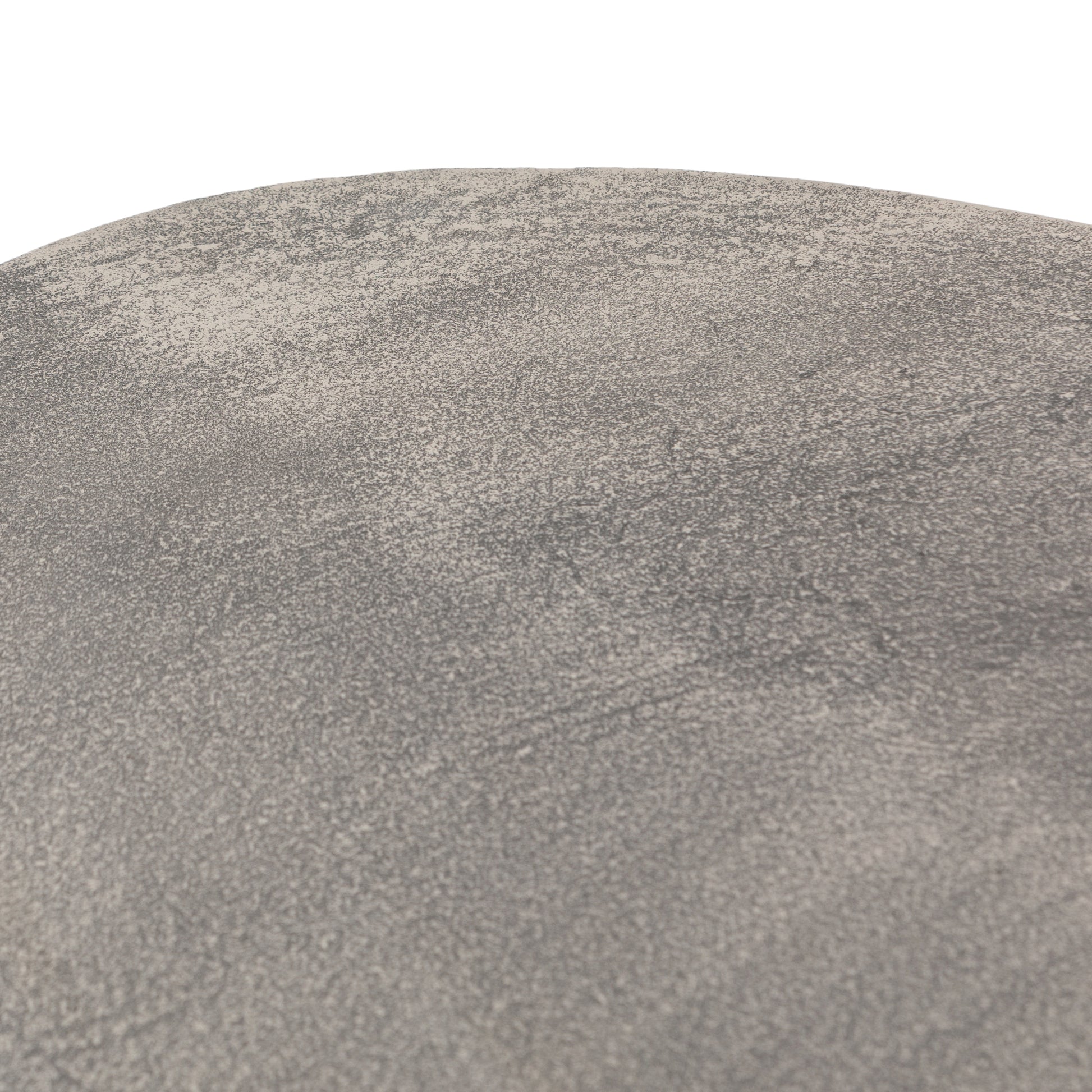 We love the oval shape of this Simone Coffee Table - Antique Nickel. The textural cast aluminum makes for a beautifully modern coffee table, with alluring highs and lows played up by a raw nickel finish. Great indoors or out; cover or store indoors during inclement weather and when not in use.  Overall Dimensions: 54.75"w x 29.25"d x 16.50"h