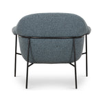 Featuring Suerte Chair - Knoll Sky by Four Hands at Amethyst Home. We love the curvy silhouette and classic rolled arms of this Suerte Chair - Knoll Sky. Sky-blue boucle lends a fresh feel to vintage-inspired accent seating for any living room, office, or other area. 
Overall Dimensions: 35"W x 33.50"L x 31"HColors: Knoll Sky, Matte EbonyMaterials: 95% Pl,.  Amethyst Home provides interior design, new home construction design consulting, vintage area rugs, and lighting in the Calabasas metro area.