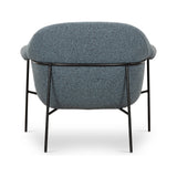 Featuring Suerte Chair - Knoll Sky by Four Hands at Amethyst Home. We love the curvy silhouette and classic rolled arms of this Suerte Chair - Knoll Sky. Sky-blue boucle lends a fresh feel to vintage-inspired accent seating for any living room, office, or other area. 
Overall Dimensions: 35"W x 33.50"L x 31"HColors: Knoll Sky, Matte EbonyMaterials: 95% Pl,.  Amethyst Home provides interior design, new home construction design consulting, vintage area rugs, and lighting in the Calabasas metro area.