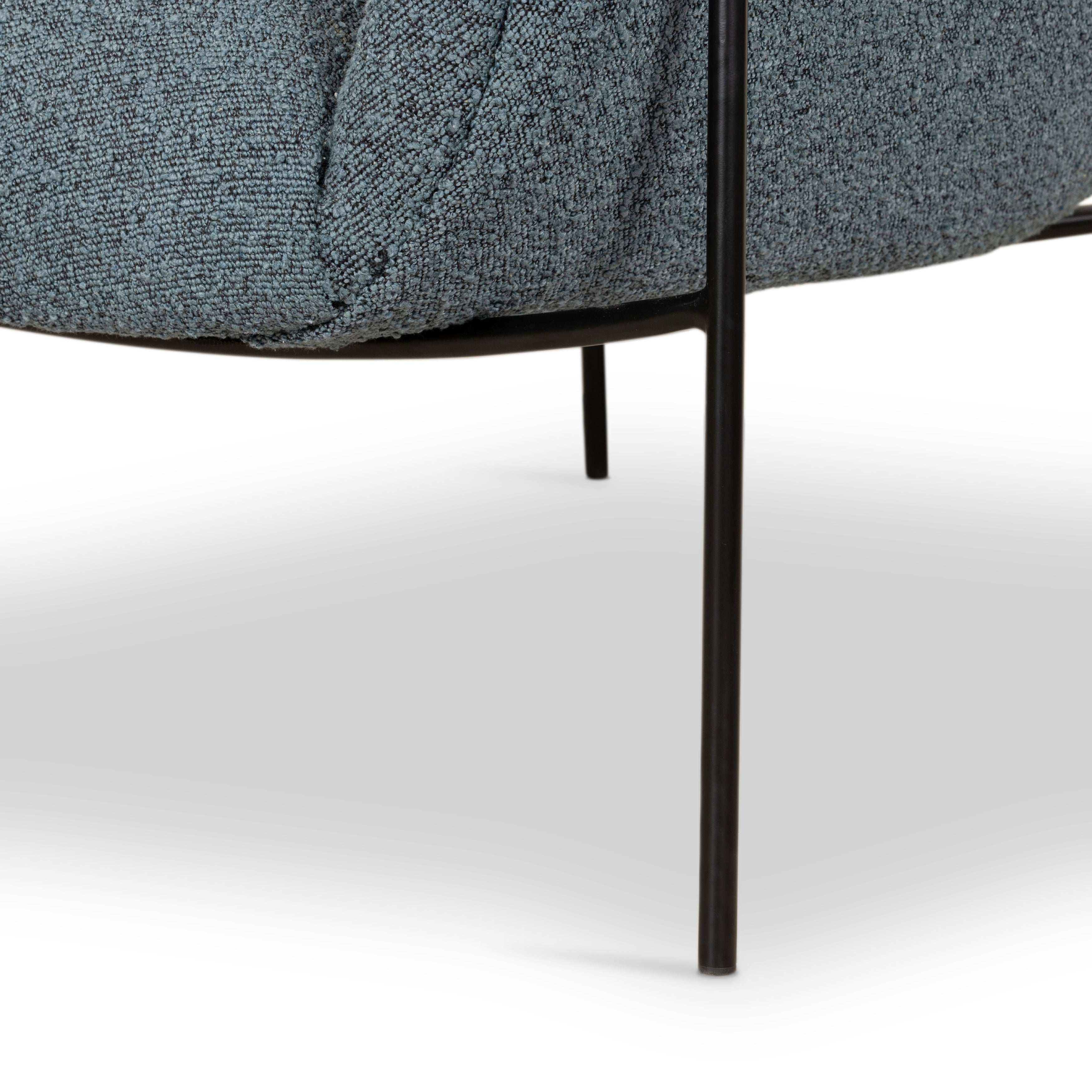 We love the curvy silhouette and classic rolled arms of this Suerte Chair - Knoll Sky. Sky-blue boucle lends a fresh feel to vintage-inspired accent seating for any living room, office, or other area.   Overall Dimensions: 35.00"w x 33.50"d x 31.00"h
