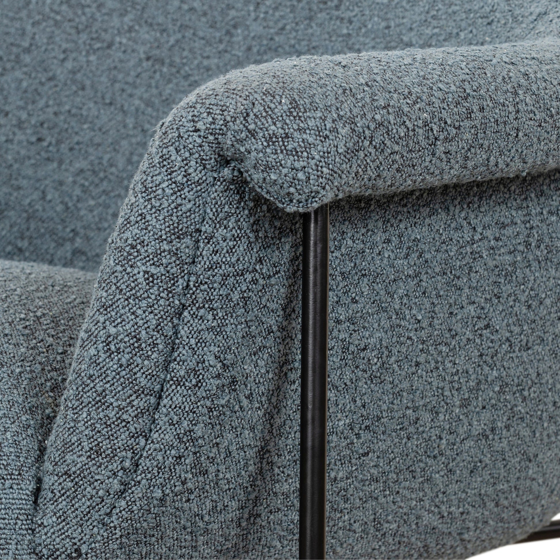 We love the curvy silhouette and classic rolled arms of this Suerte Chair - Knoll Sky. Sky-blue boucle lends a fresh feel to vintage-inspired accent seating for any living room, office, or other area.   Overall Dimensions: 35.00"w x 33.50"d x 31.00"h