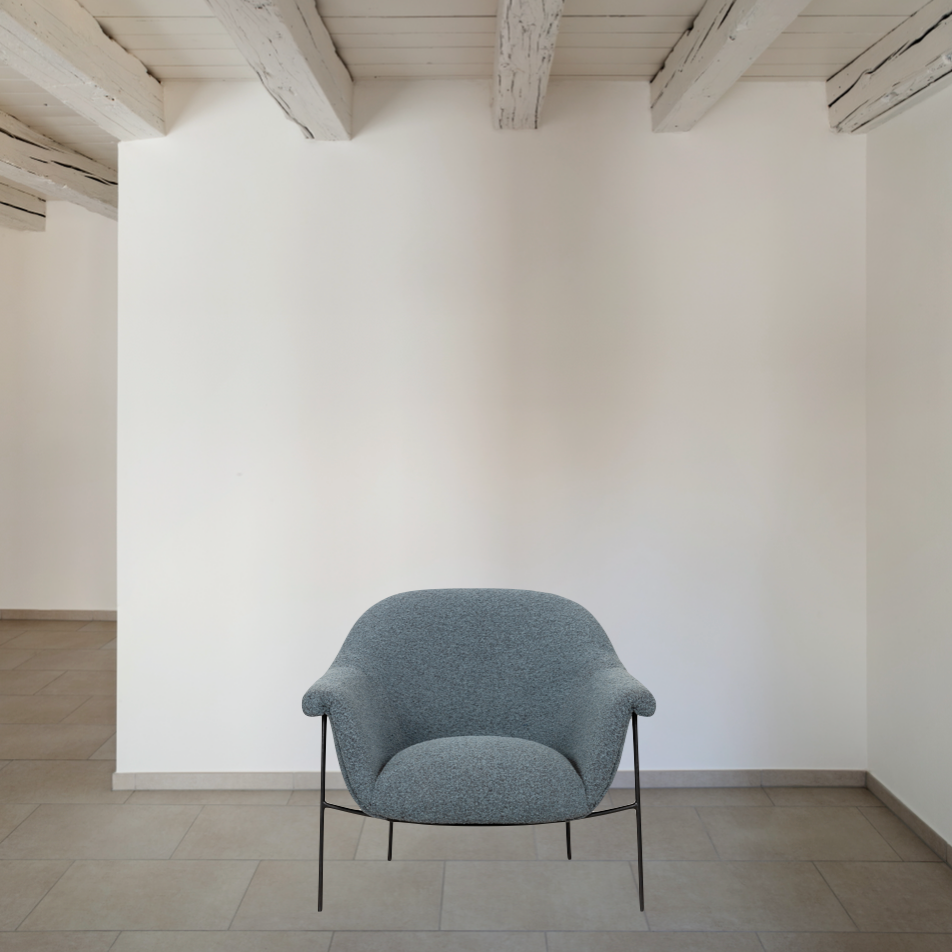 We love the curvy silhouette and classic rolled arms of this Suerte Chair - Knoll Sky. Sky-blue boucle lends a fresh feel to vintage-inspired accent seating for any living room, office, or other area.   Overall Dimensions: 35.00"w x 33.50"d x 31.00"h