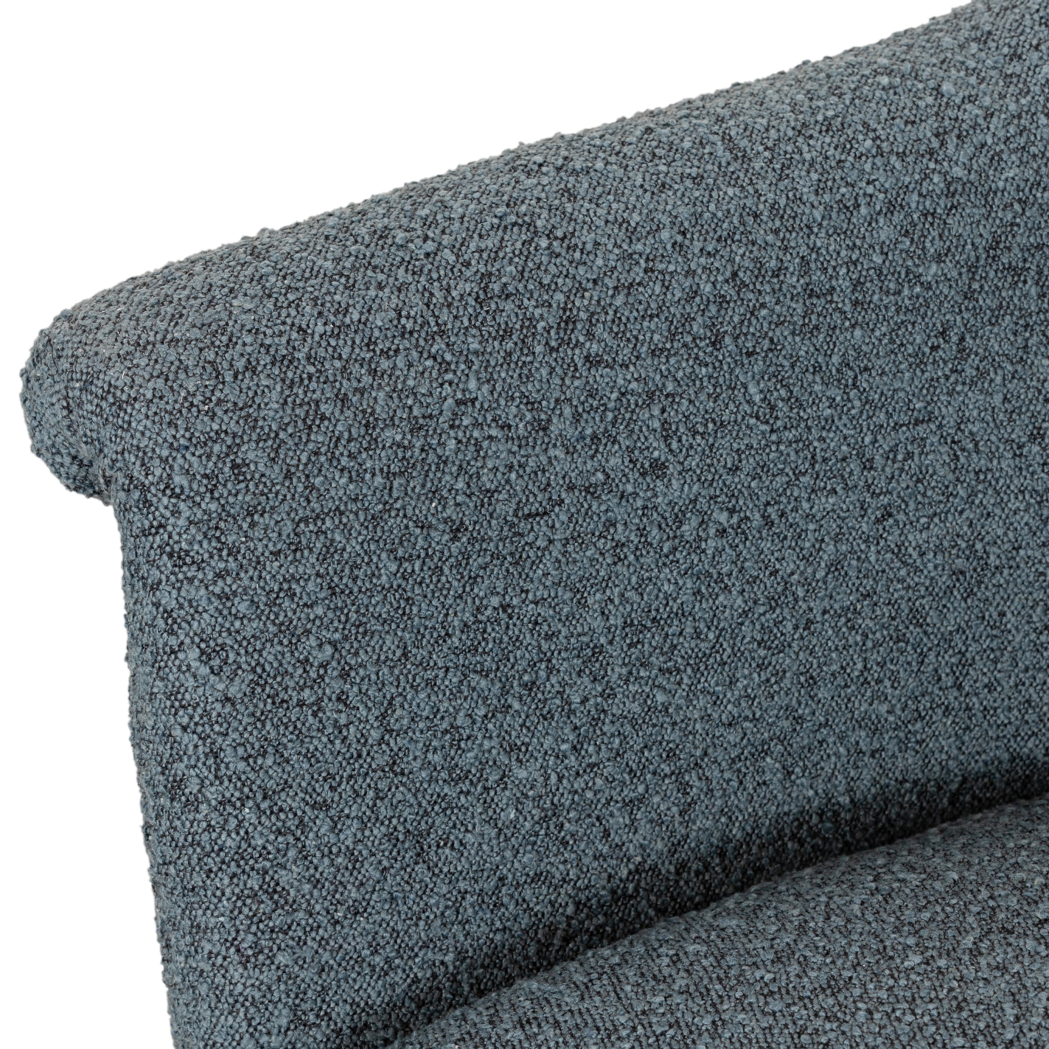 We love the curvy silhouette and classic rolled arms of this Suerte Chair - Knoll Sky. Sky-blue boucle lends a fresh feel to vintage-inspired accent seating for any living room, office, or other area.   Overall Dimensions: 35.00"w x 33.50"d x 31.00"h