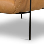 Featuring Suerte Chair - Palermo Butterscotch by Four Hands at Amethyst Home. With a curvy silhouette and classic rolled arms, this Suerte Chair - Palermo Butterscotch has butterscotch leather that lends a fresh feel to vintage-inspired accent seating. The airy iron cradle base brings a beautiful balance of scale to any living room or office!
Overall Dimension.  Amethyst Home provides interior design, new home construction design consulting, vintage area rugs, and lighting in the Tampa metro area.
