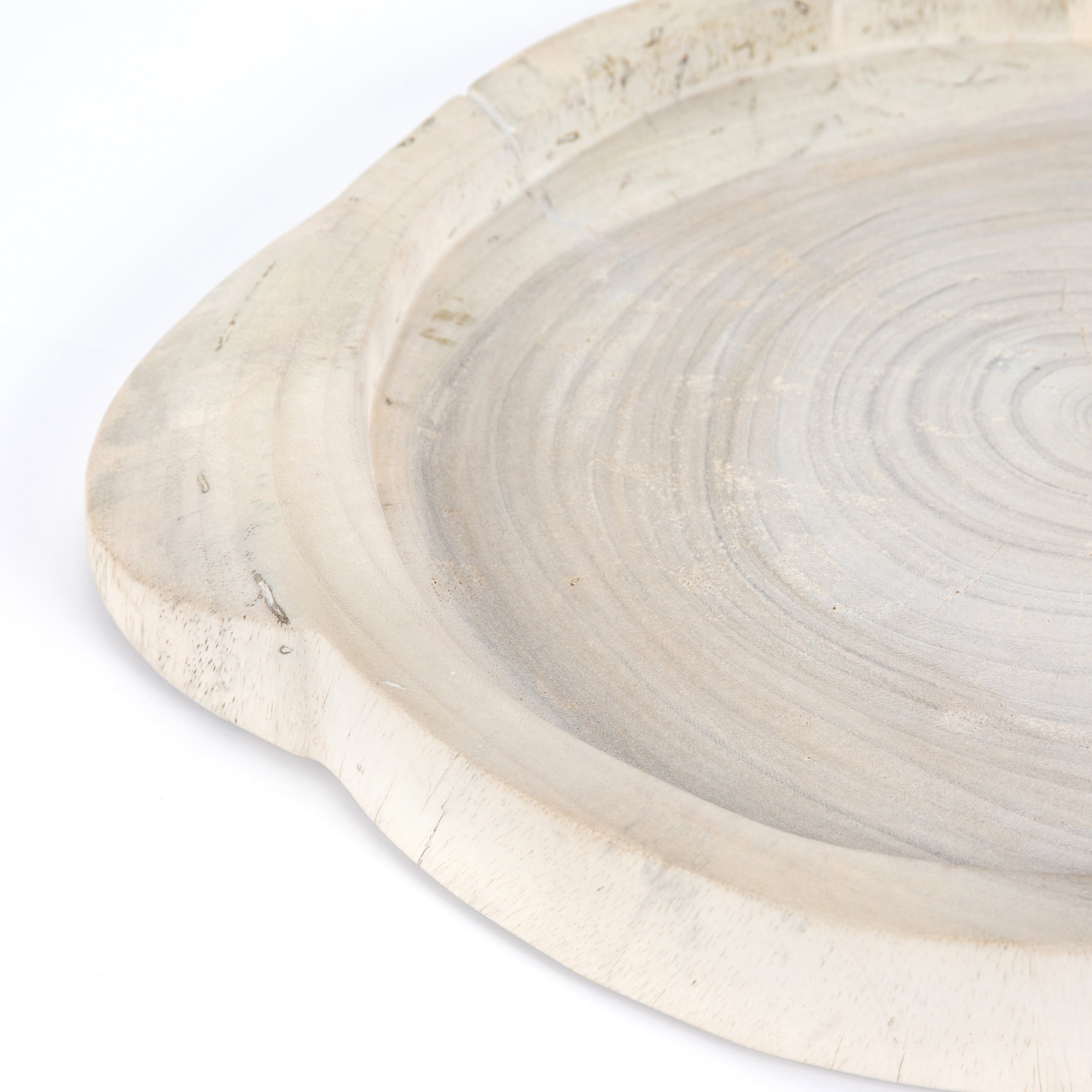 This Tadeo Round Tray - Ivory is made from reclaimed wood and has a gorgeous organic, earthy feel. Whether it's placed on your coffee table or in your kitchen, this will be your new favorite tray!  Amethyst Home celebrates natural materials, which often comes with beautiful imperfections. Each piece is made uniquely for you, please expect some variation and character. We embrace the design approach of Wabi Sabi!  Overall Dimensions: 23.50"w x 19.75"d x 1.75"h Colors: Ivory Materials: Solid Reclaimed Wood