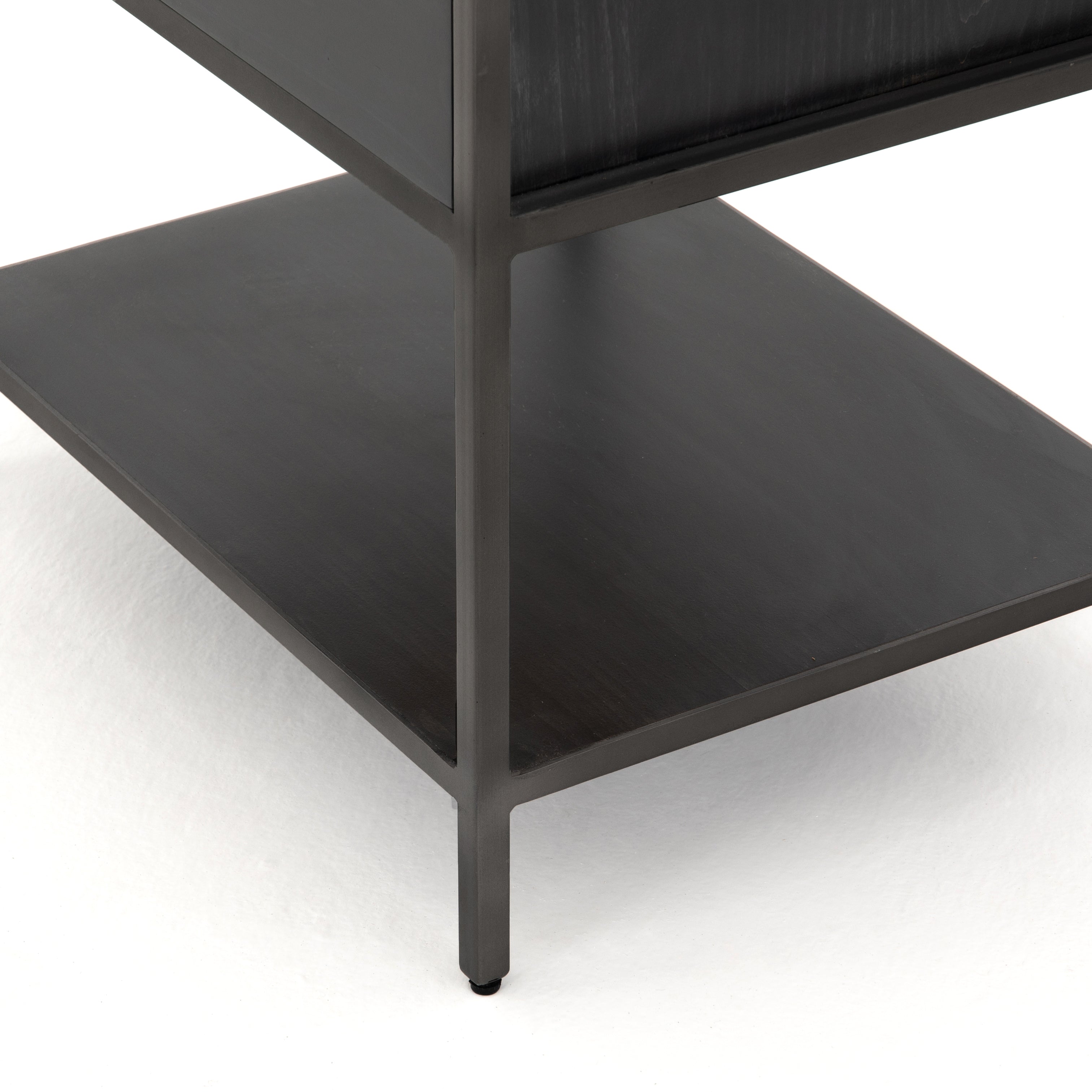 This stylish Trey Bookshelf - Black Wash Poplar offers ample storage space by way of open shelving and dual drawers. Metal-secured pulls of toffee top-grain leather add a textural element of surprise to any office, bedroom, or other space.   Overall Dimensions: 24.00"w x 18.00"d x 78.25"h