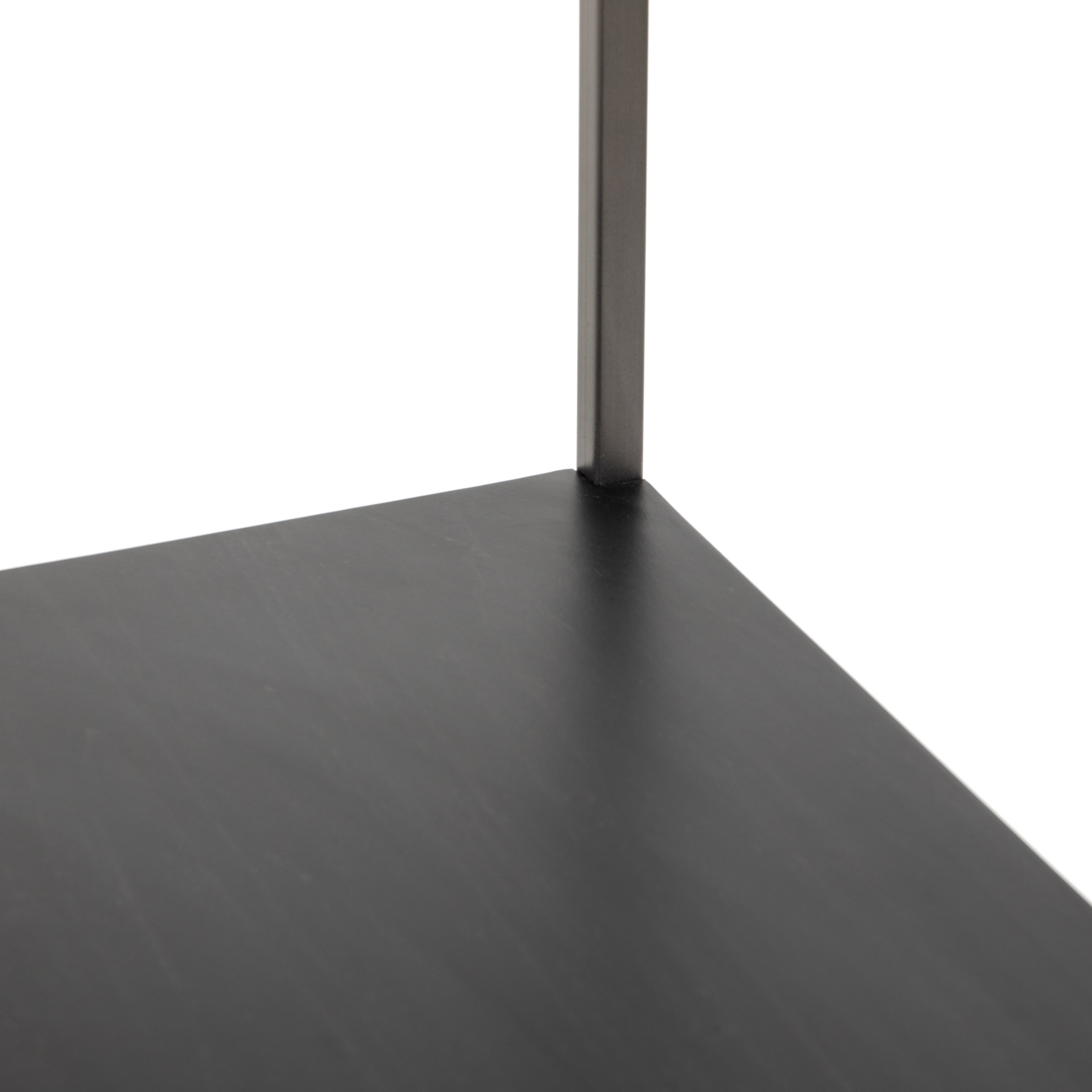 This stylish Trey Bookshelf - Black Wash Poplar offers ample storage space by way of open shelving and dual drawers. Metal-secured pulls of toffee top-grain leather add a textural element of surprise to any office, bedroom, or other space.   Overall Dimensions: 24.00"w x 18.00"d x 78.25"h