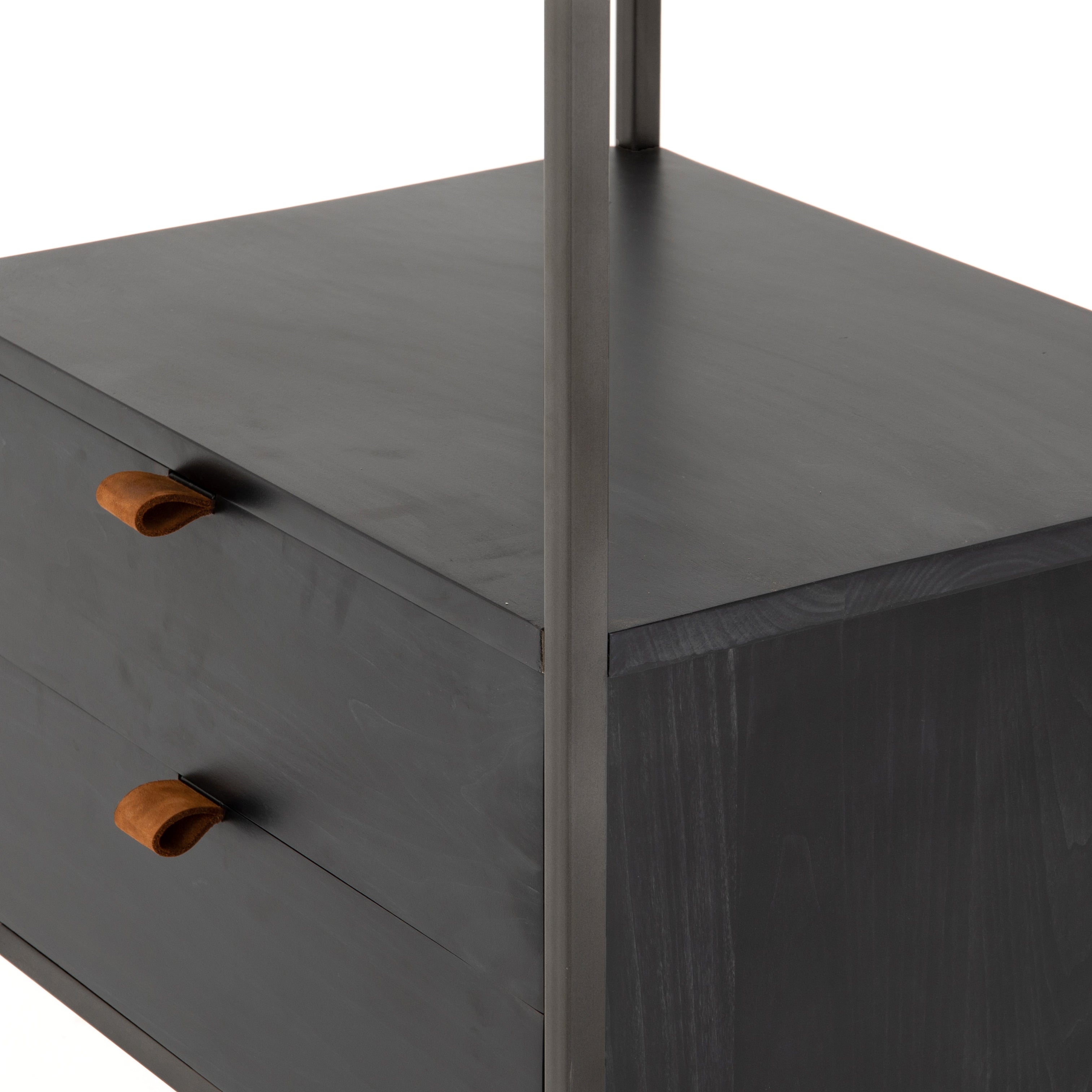 This stylish Trey Bookshelf - Black Wash Poplar offers ample storage space by way of open shelving and dual drawers. Metal-secured pulls of toffee top-grain leather add a textural element of surprise to any office, bedroom, or other space.   Overall Dimensions: 24.00"w x 18.00"d x 78.25"h