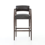 Featuring Tyler Chaps Ebony Counter Stool by Four Hands at Amethyst Home. The Tyler Counter Stool in Chaps Ebony makes counter seating stylish with an angular, dark and smoky birch frame, a deep seat, and a striking, low-slung back. The stool is comfortable for long dinners and conversations with a covered black, top-grain leather seat and back.
Count.  Amethyst Home provides interior design, new home construction design consulting, vintage area rugs, and lighting in the Salt Lake City metro area.