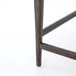 Featuring Tyler Chaps Ebony Counter Stool by Four Hands at Amethyst Home. The Tyler Counter Stool in Chaps Ebony makes counter seating stylish with an angular, dark and smoky birch frame, a deep seat, and a striking, low-slung back. The stool is comfortable for long dinners and conversations with a covered black, top-grain leather seat and back.
Counte.  Amethyst Home provides interior design, new home construction design consulting, vintage area rugs, and lighting in the Newport Beach metro area.