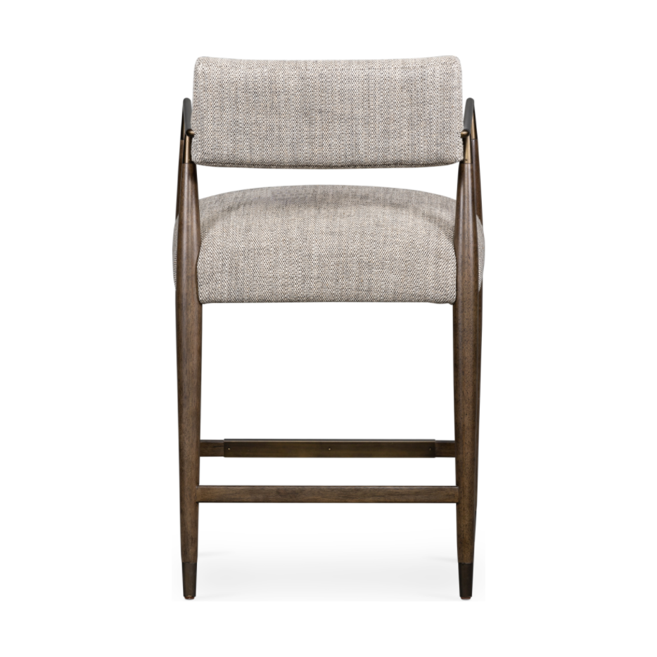 Featuring Waldon Counter Stool by Four Hands at Amethyst Home. Slim, sculptural style with this Waldon Counter Stool. Angular framing features a mix of bronze-finished metal and solid rubberwood, for a forward-thinking feel. Textural linen-blend seating adopts an invitingly neutral grey hue to move freely between spaces and styles.
Size: 23.25"W x 24.50"L x 37.  Amethyst Home provides interior design, new home construction design consulting, vintage area rugs, and lighting in the Tampa metro area.