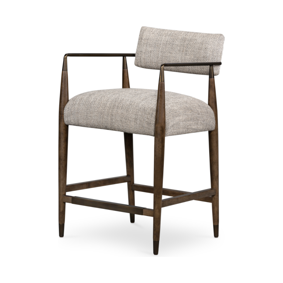 Featuring Waldon Counter Stool by Four Hands at Amethyst Home. Slim, sculptural style with this Waldon Counter Stool. Angular framing features a mix of bronze-finished metal and solid rubberwood, for a forward-thinking feel. Textural linen-blend seating adopts an invitingly neutral grey hue to move freely between spaces and styles.
Size: 23.25"W x 24.50"L x.  Amethyst Home provides interior design, new home construction design consulting, vintage area rugs, and lighting in the Monterey metro area.