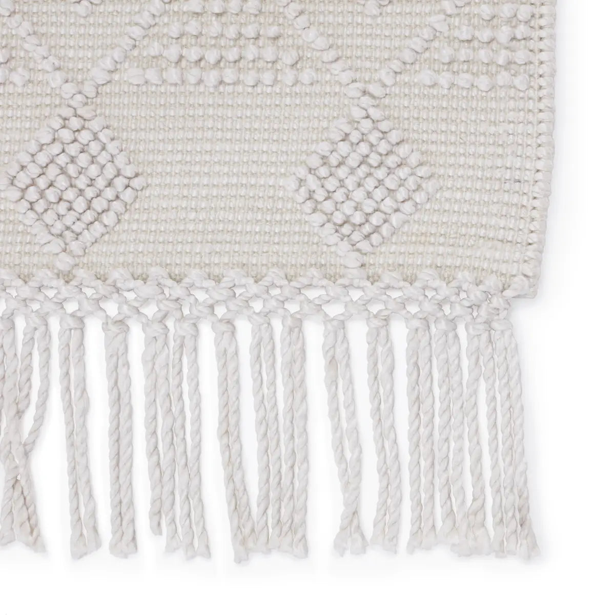 Featuring Cosette Esma Rug by Jaipur Living at Amethyst Home. The handwoven Cosette Esma Area Rug features a textural feel and casual, fun style. The Esma rug showcases a boucle-style geometric design in a light and airy white colorway. Crafted of PET yarn, or recycled plastic, this chic and durable rug brings warmth and a hint of global appeal to indoor a.  Amethyst Home provides interior design, new home construction design consulting, vintage area rugs, and lighting in the Nashville metro area.