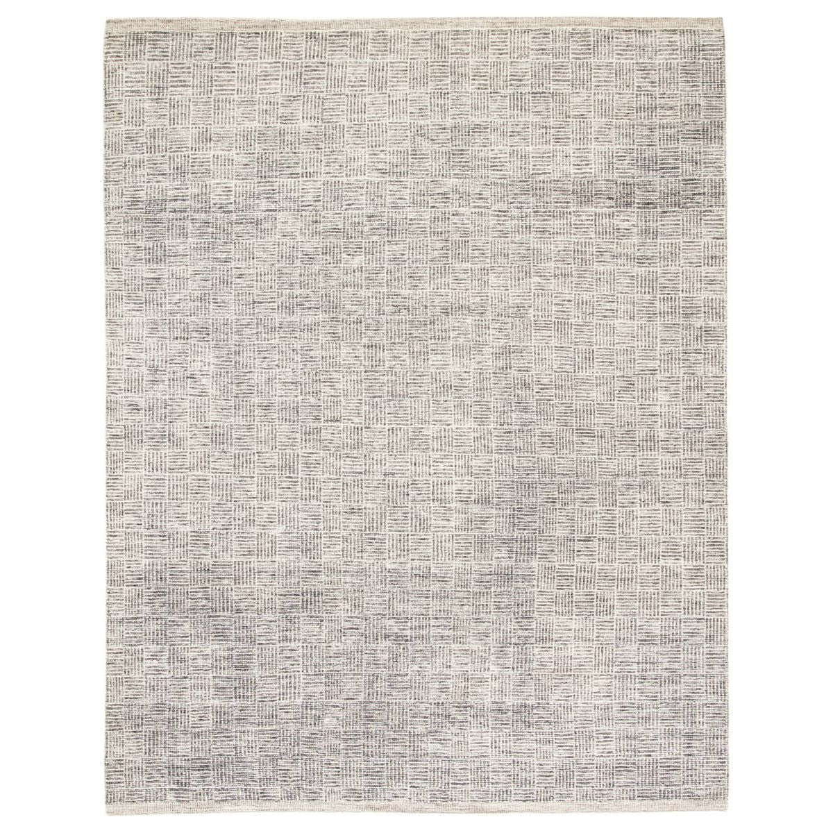 The Rize Mugler Area Rug offers intricate and delicately designed global patterns to the modern home. A thatched square motif creates an eye-catching geometric design on the artistically distressed Mugler area rug. In an earthy ivory and black colorway, this durable hand-knotted wool accent blends a timeless craft with contemporary charm.  Hand Knotted 100% Wool RIZ05