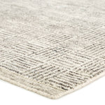 The Rize Mugler Area Rug offers intricate and delicately designed global patterns to the modern home. A thatched square motif creates an eye-catching geometric design on the artistically distressed Mugler area rug. In an earthy ivory and black colorway, this durable hand-knotted wool accent blends a timeless craft with contemporary charm.  Hand Knotted 100% Wool RIZ05