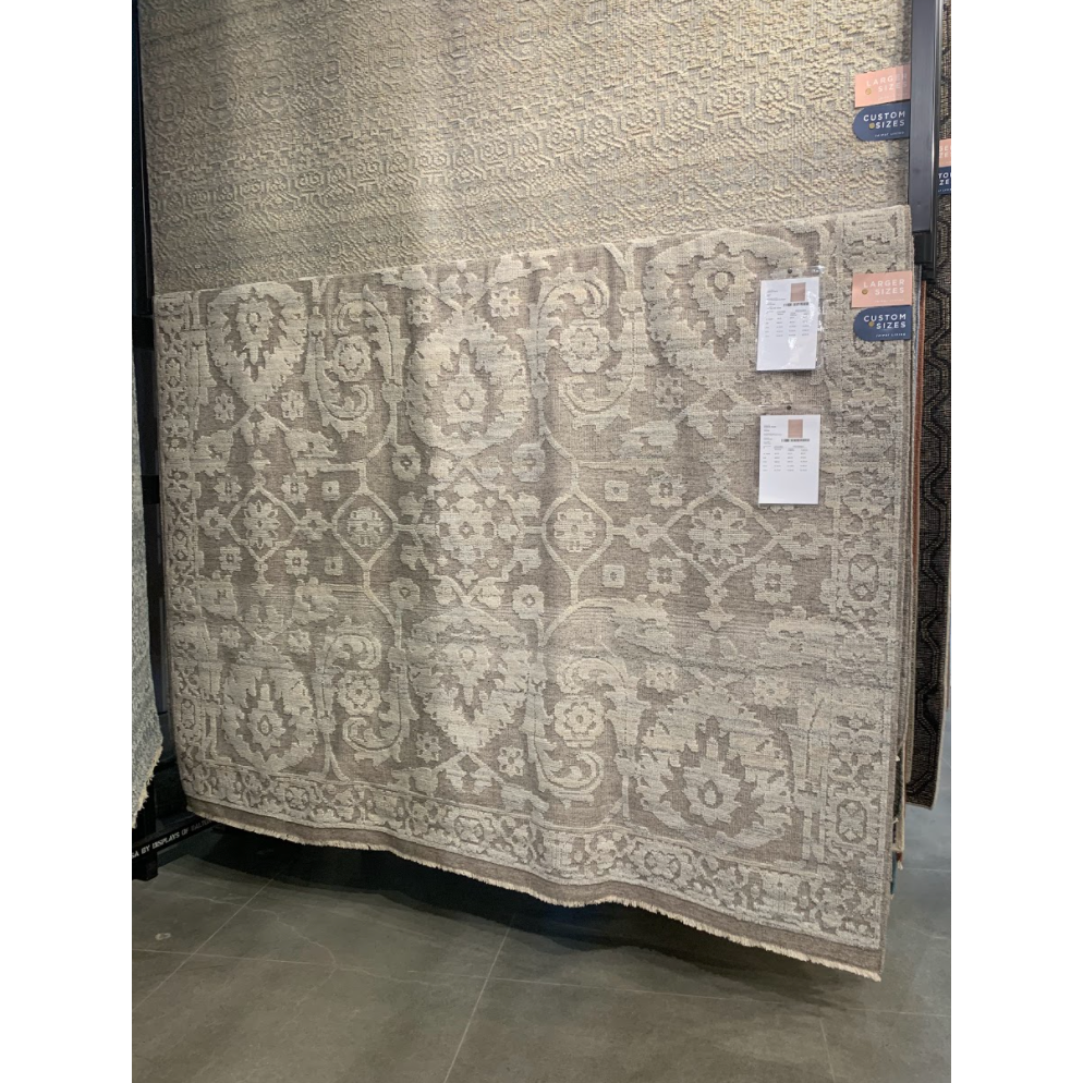 Featuring Sonnette Ayres Hand-Knotted Rug by Jaipur Living at Amethyst Home. The richly textured and elegantly designed Sonnette Ayres Area Rug combines an inviting, soft hand and eye-catching transitional style. The Ayres rug boasts a neutral palette of light taupe and gray that creates beautiful dimension among the brocade design. This hand-knotted wool rug.  Amethyst Home provides interior design, new home construction design consulting, vintage area rugs, and lighting in the Austin metro area.