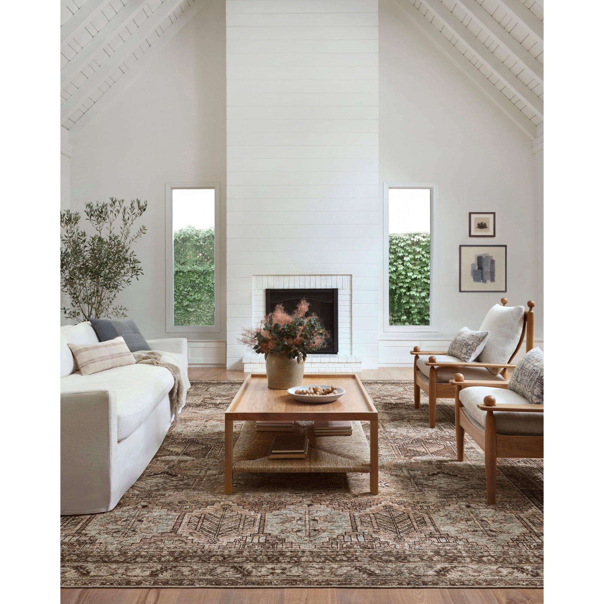 Touting richly saturated colors and a distressed pattern, the Billie Collection captures the look of a well-worn antique rug at a remarkable value. Reminiscent of one-of-a-kind rugs, this Amber Lewis x Loloi collection features random variations in color that render no two pieces exactly alike, creating up to 30% variance in color.  BIL-03 AL Clay / Sage