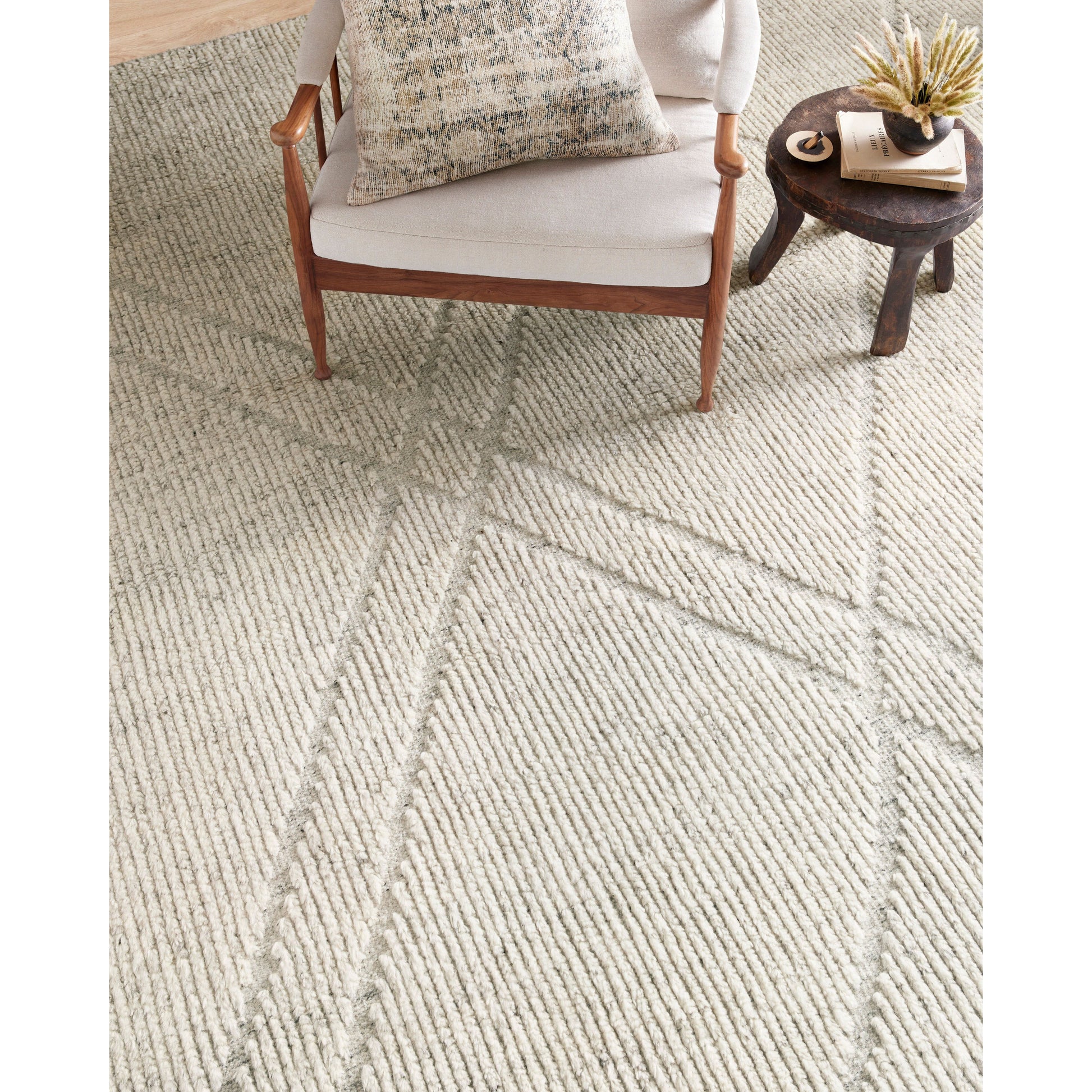 With its organic lines and tonal hues, the Gwyneth Collection for Amber Lewis x Loloi is made for everyday living. Featuring sophisticated colors and a soft pile, this collection is the a perfect blend between refined and relaxed. Gwyneth is also GoodWeave-Certified, ensuring our commitment to ethical product and the support of weavers' communities. GWY-03 AL Ivory / Silver
