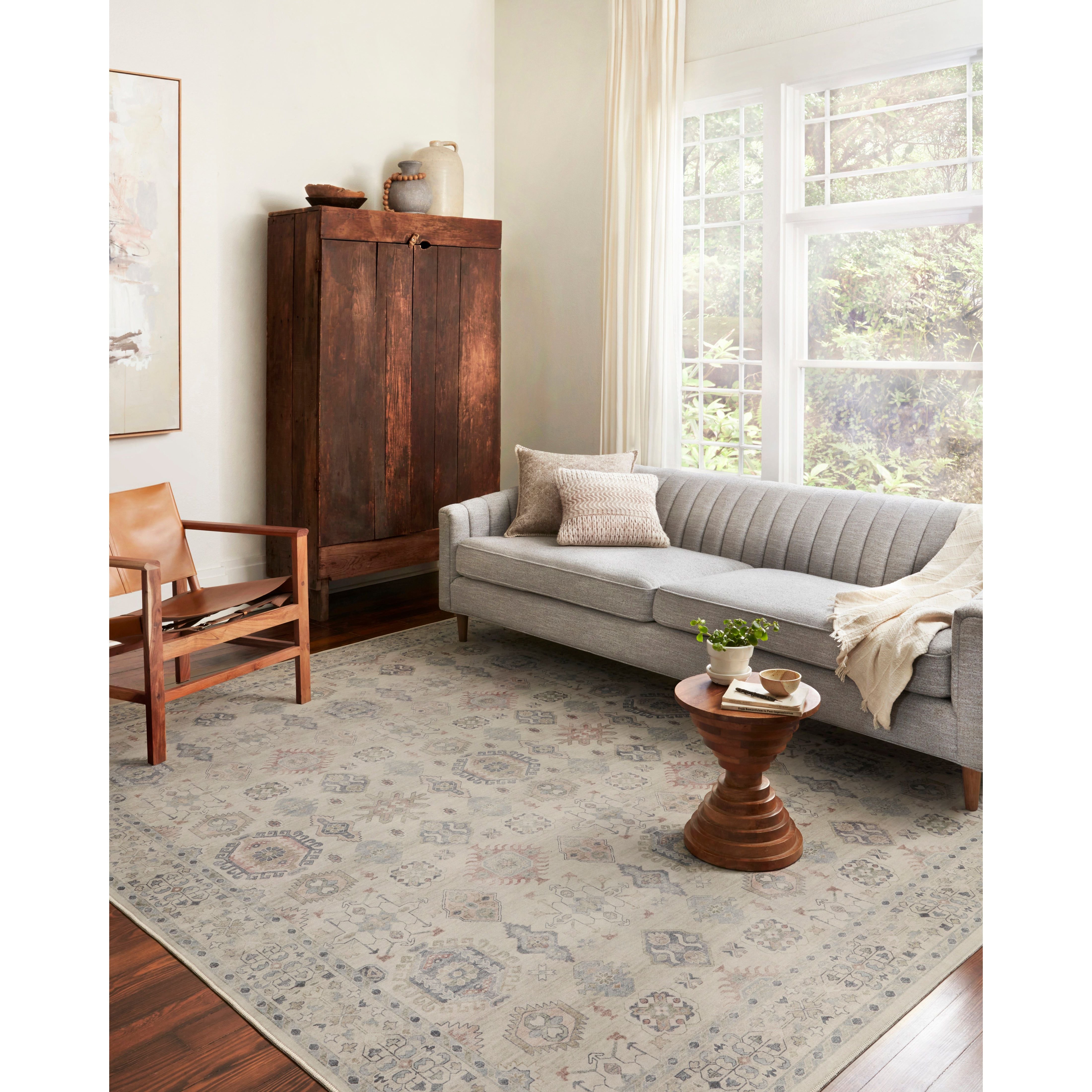 Featuring Hathaway Beige/Multi Rug by Loloi at Amethyst Home. Featuring soft motifs in a carefully curated color palate of beige, ivory, and hints of black, the Hathaway Beige / Multi area rug captures the essence of one-of-a-kind vintage or antique area rug at an attractive price.
This rug is ideal for high traffic areas due to the rug's power-loomed dur.  Amethyst Home provides interior design, new home construction design consulting, vintage area rugs, and lighting in the Scottsdale metro area.