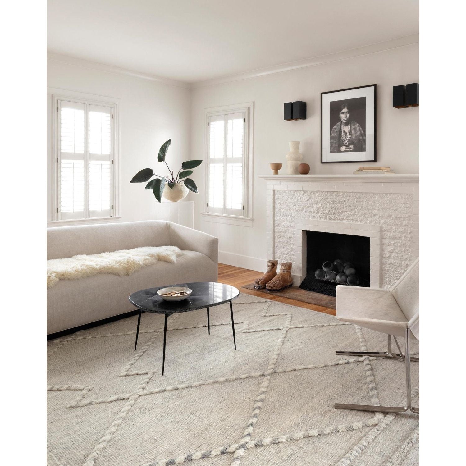 A new take on Moroccan style rugs, the Iman Collection is hand-knotted of 100% wool pile by skilled artisans in India. The surface features linear and braided details, creating tonal variations that make each piece unique. Plus, each design is finished with playful fringe.  Hand Knotted 100% Wool Pile IMA-03 Ivory / Light Grey