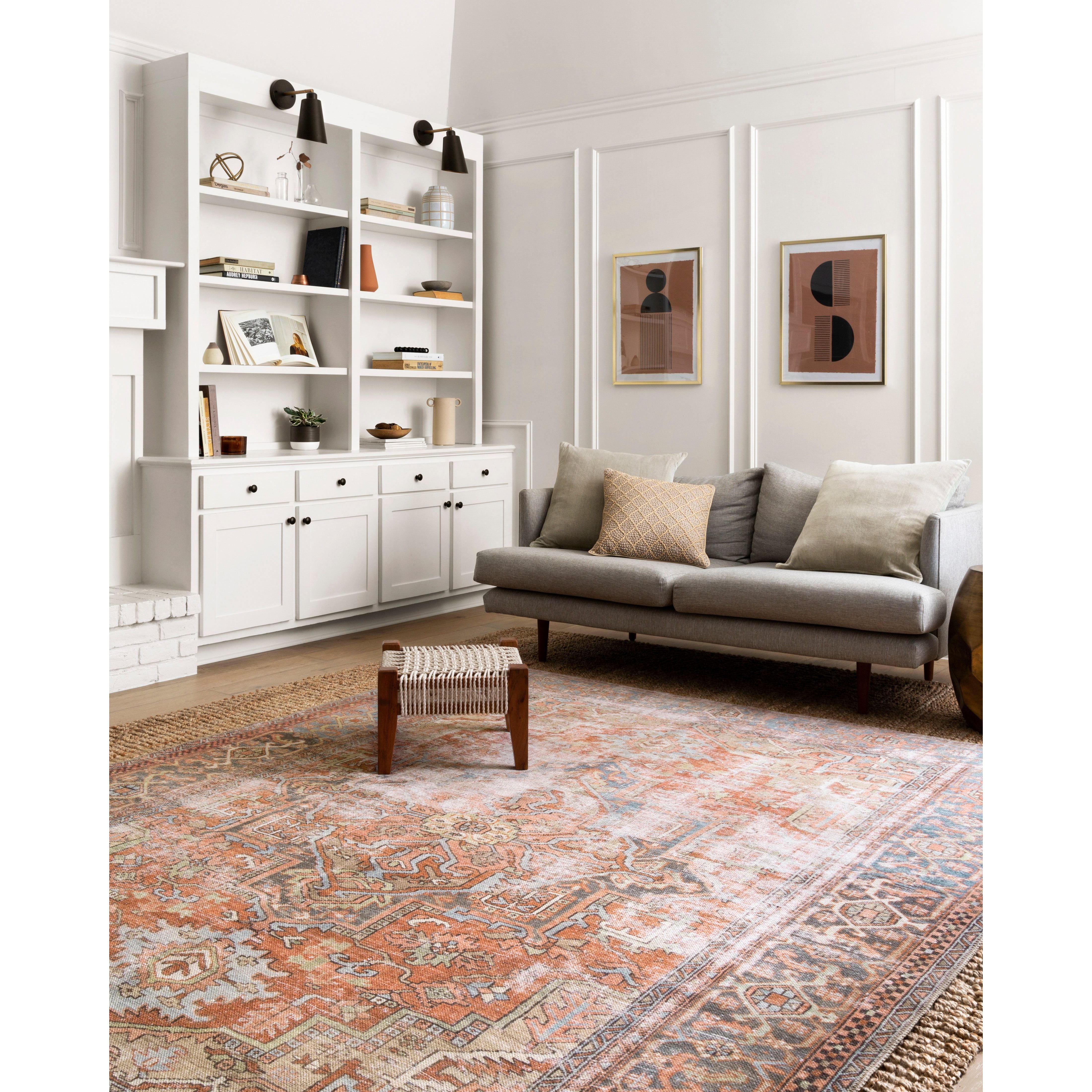 Perfect for families with kids and pets and very easy to clean and maintain. Comes in area, cute kitchen and hallway runner sizes. The rug warms up any room with tones of red, blue, and ivory. The Loren Terracotta / Sky rug from Loloi captures the spirit of a one-of-a-kind vintage and antique area rug.